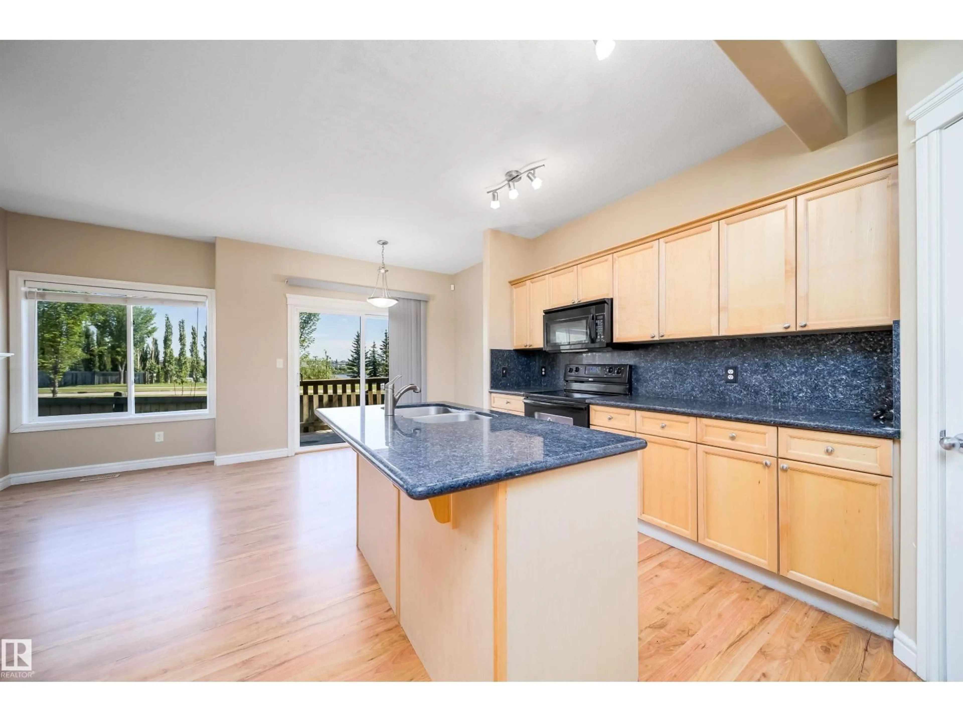 Open concept kitchen, unknown for 46 15151 43 ST NW, Edmonton Alberta T5Y0L3