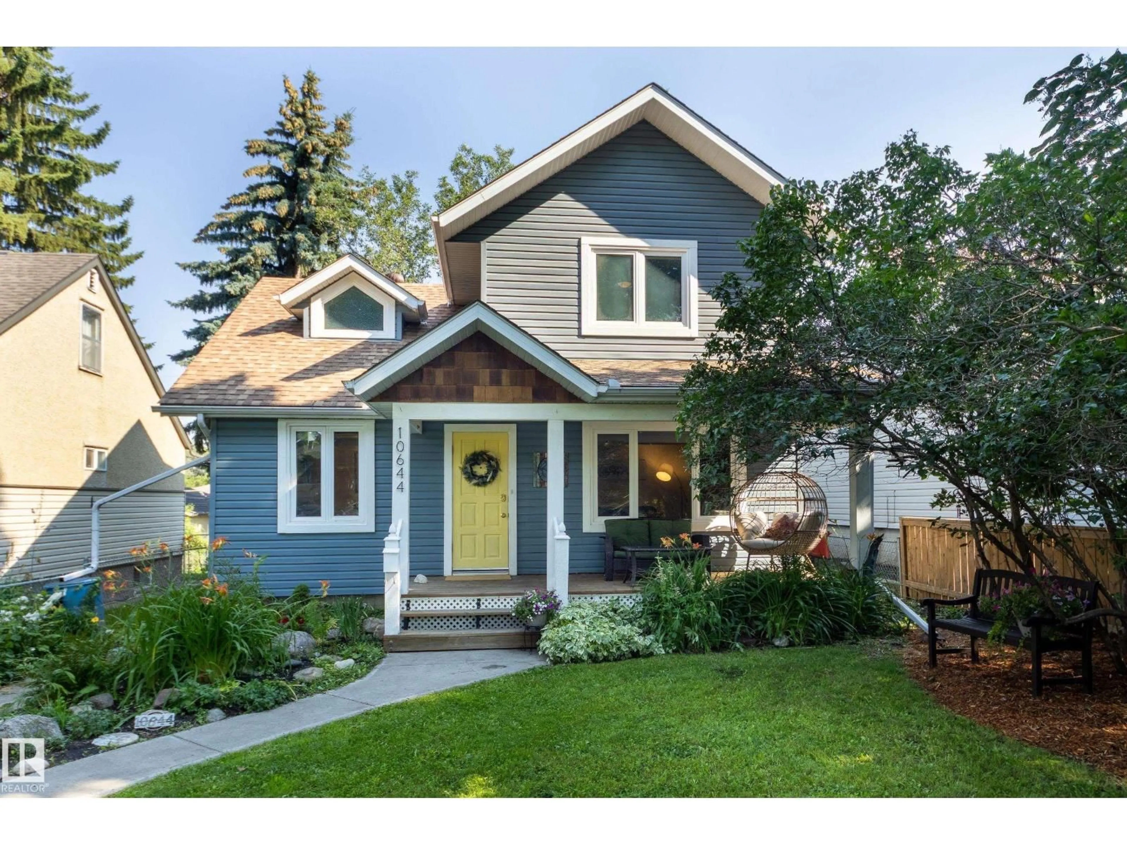 Home with vinyl exterior material, street for 10644 65 AV, Edmonton Alberta T6H1V4