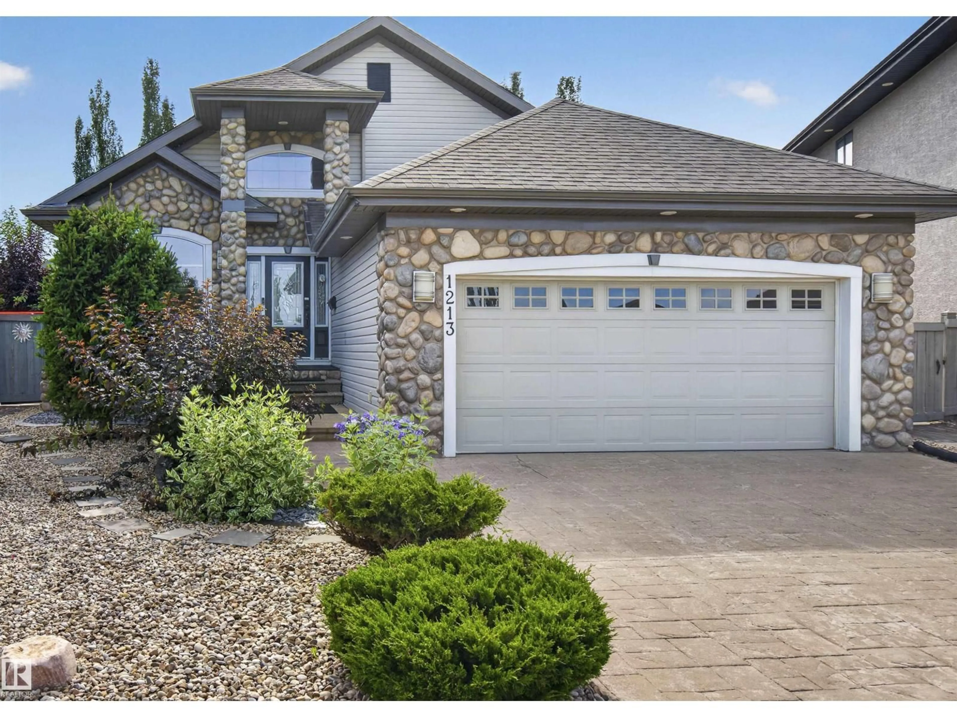 Home with vinyl exterior material, street for 1213 CUNNINGHAM DR, Edmonton Alberta T6W0R5