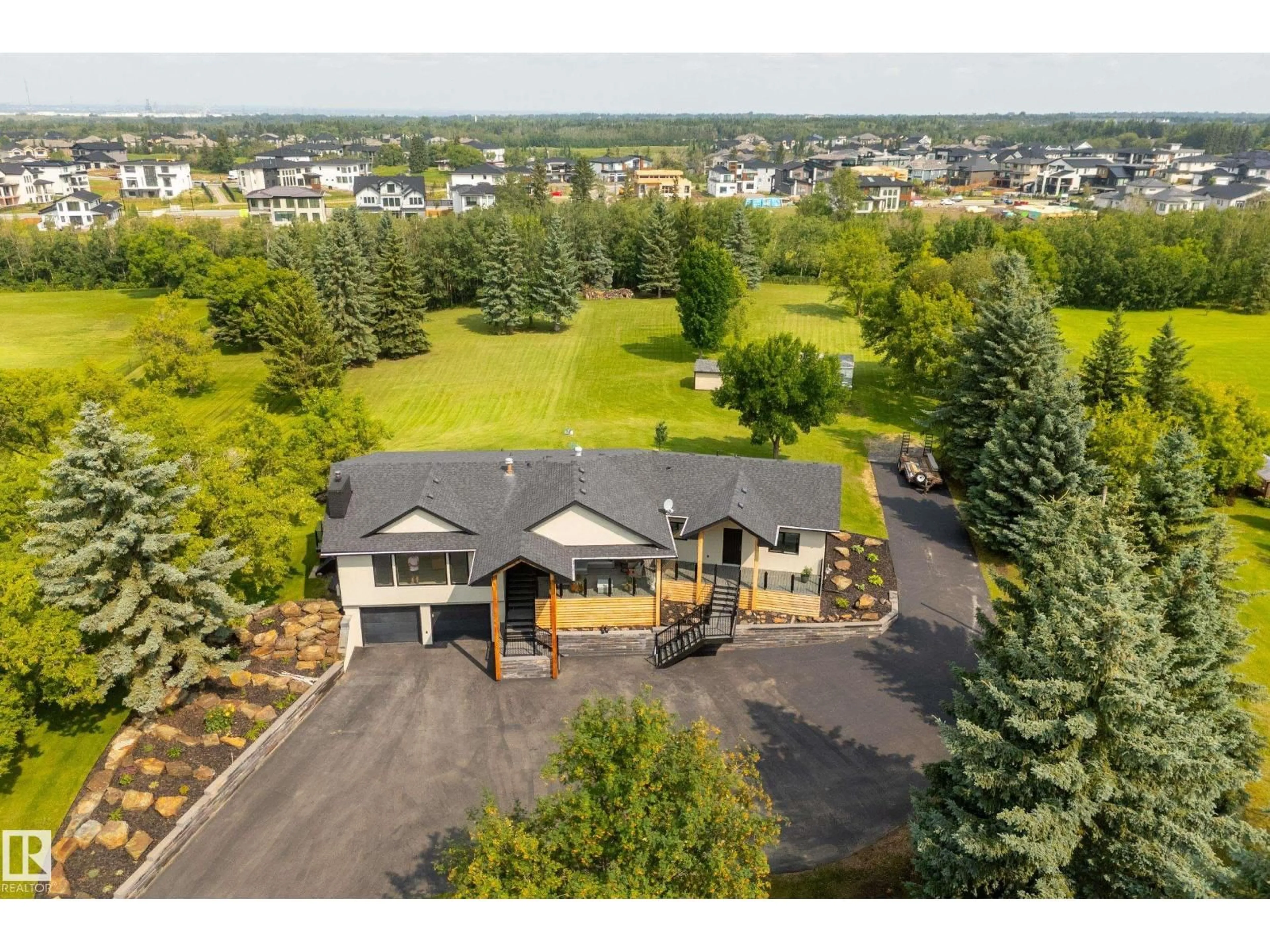 A pic from outside/outdoor area/front of a property/back of a property/a pic from drone, unknown for 52249 - 193 RGE ROAD 233, Rural Strathcona County Alberta T8B1C7