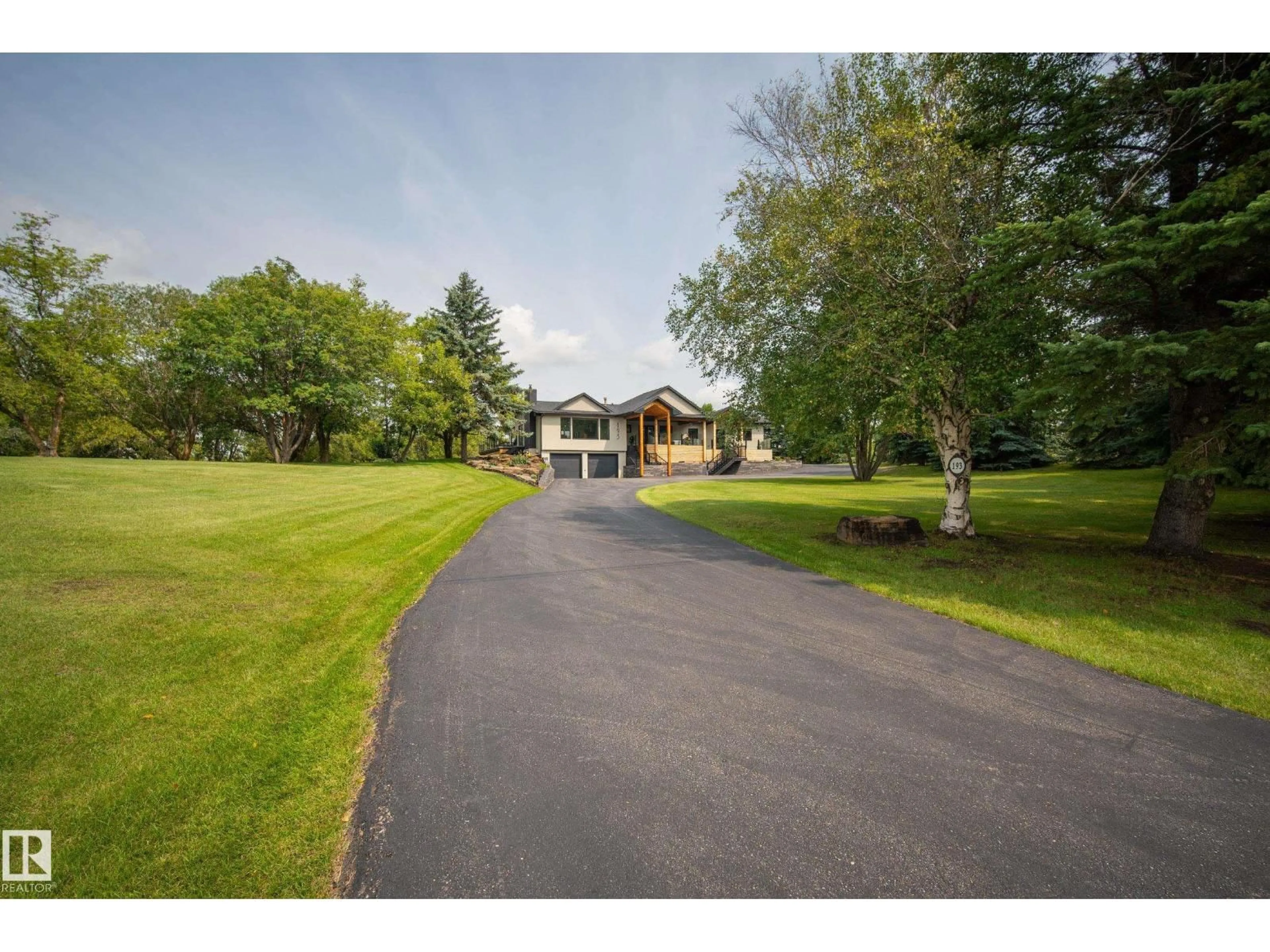 A pic from outside/outdoor area/front of a property/back of a property/a pic from drone, unknown for 52249 - 193 RGE ROAD 233, Rural Strathcona County Alberta T8B1C7