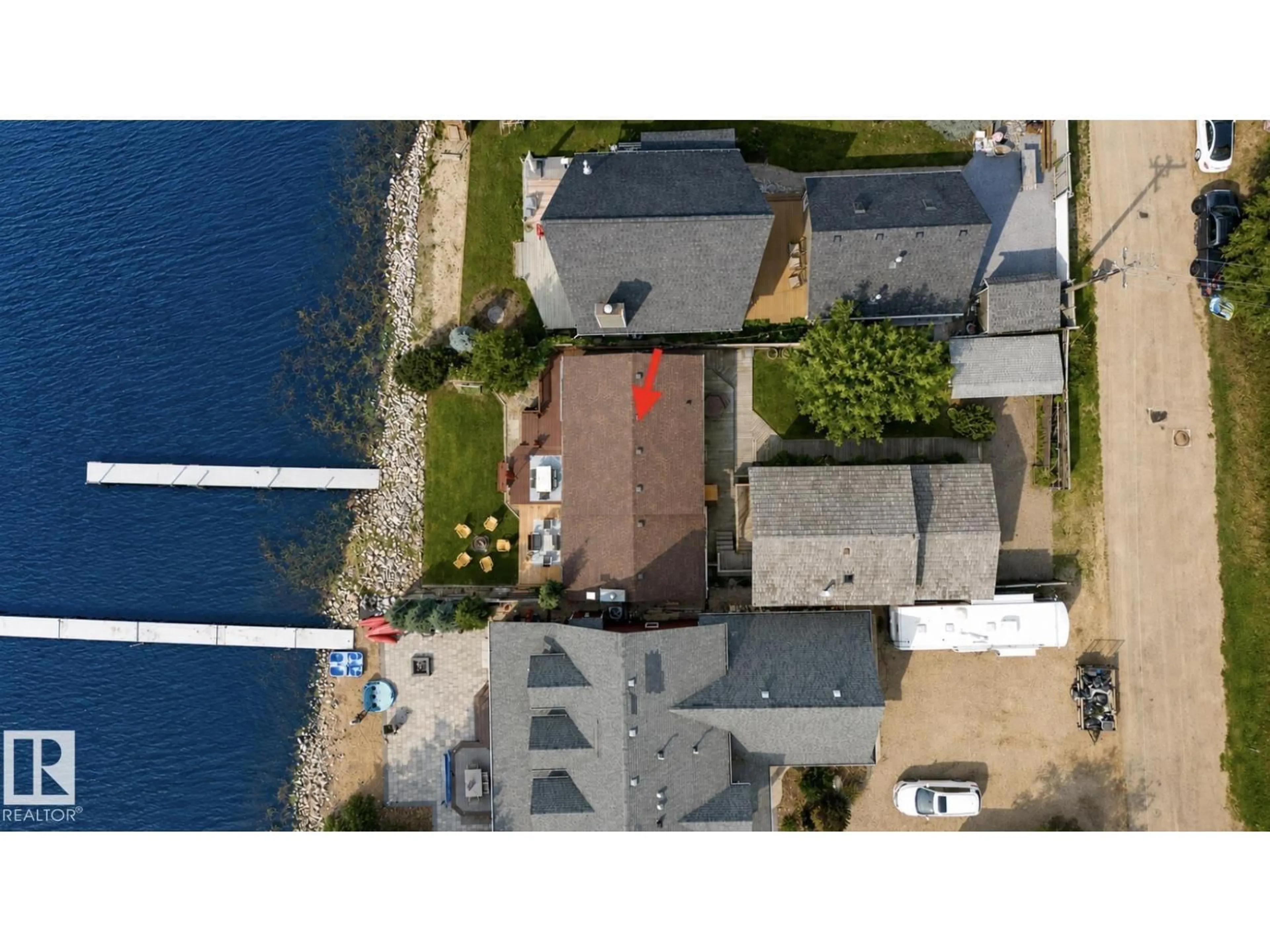 A pic from outside/outdoor area/front of a property/back of a property/a pic from drone, water/lake/river/ocean view for 15 WICKS STREET, Rural Leduc County Alberta T0C2P0