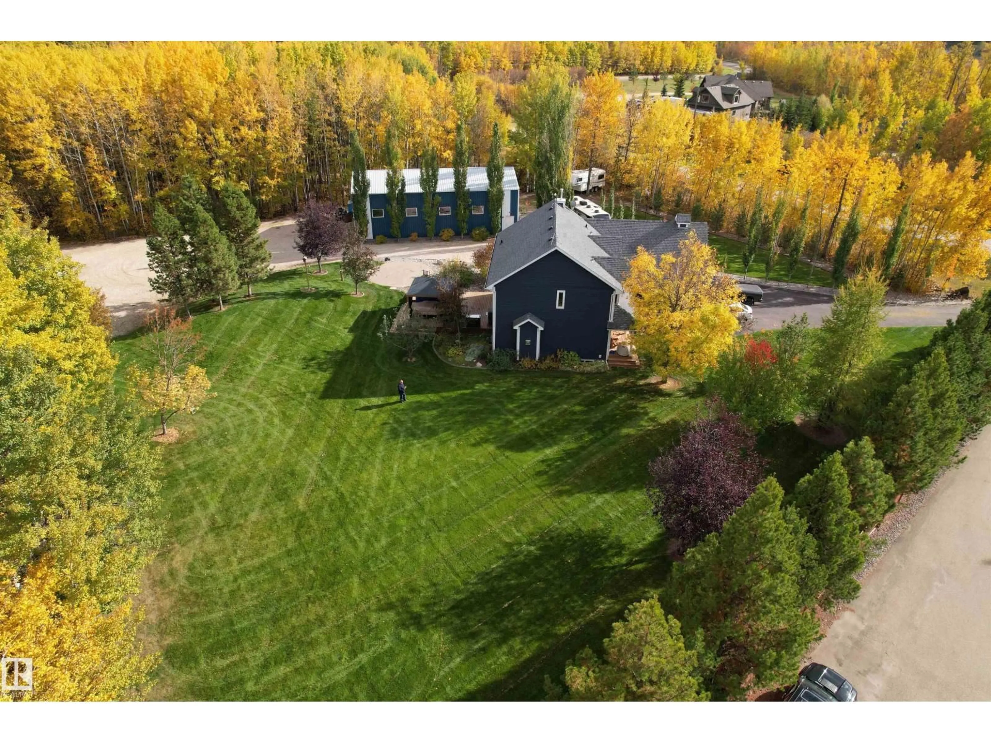 A pic from outside/outdoor area/front of a property/back of a property/a pic from drone, forest/trees view for 4 TWP ROAD 540, Rural Parkland County Alberta T7X3V4