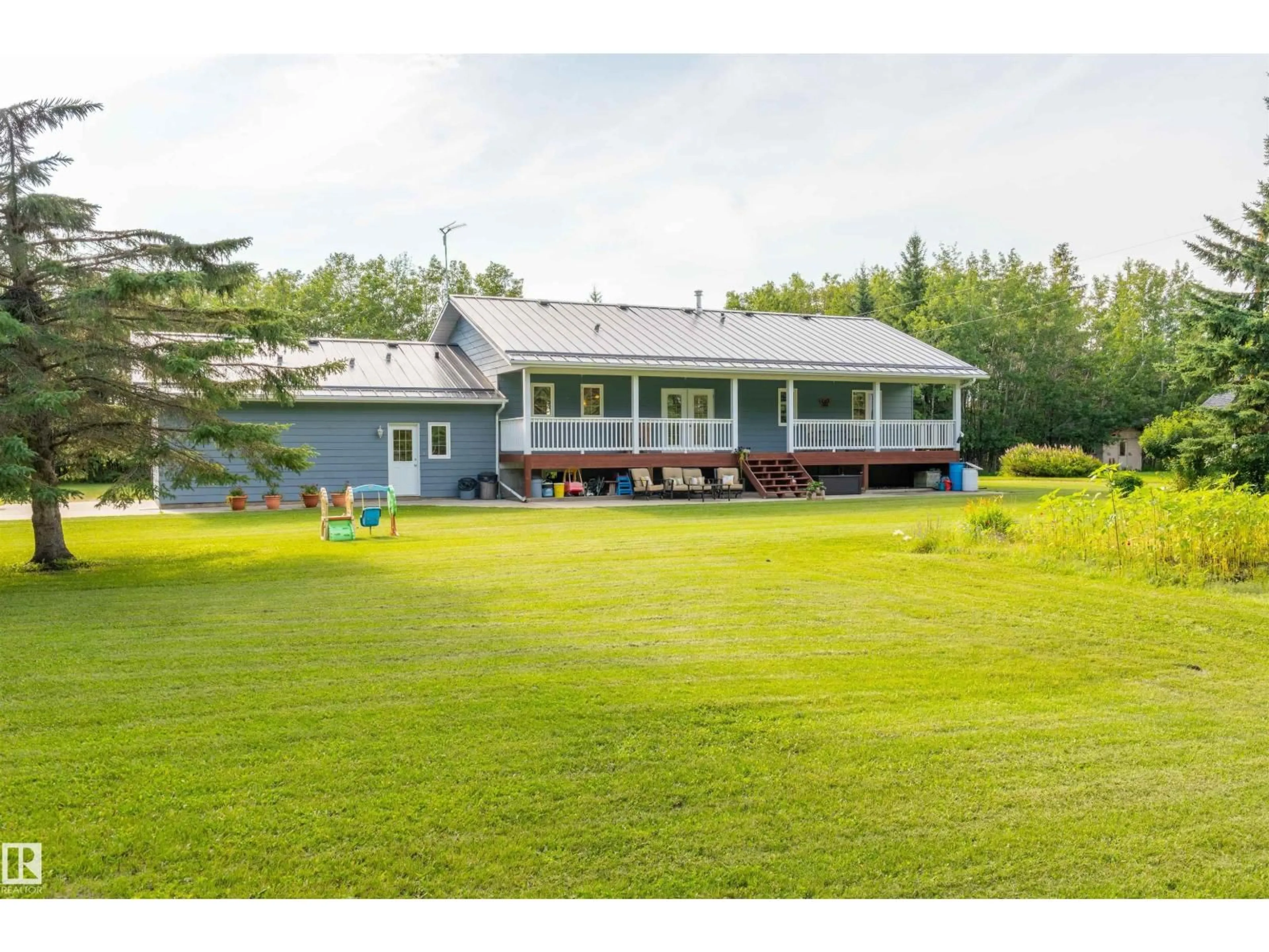 A pic from outside/outdoor area/front of a property/back of a property/a pic from drone, unknown for 59125 RANGE ROAD 102, Rural St. Paul County Alberta T0A3A0