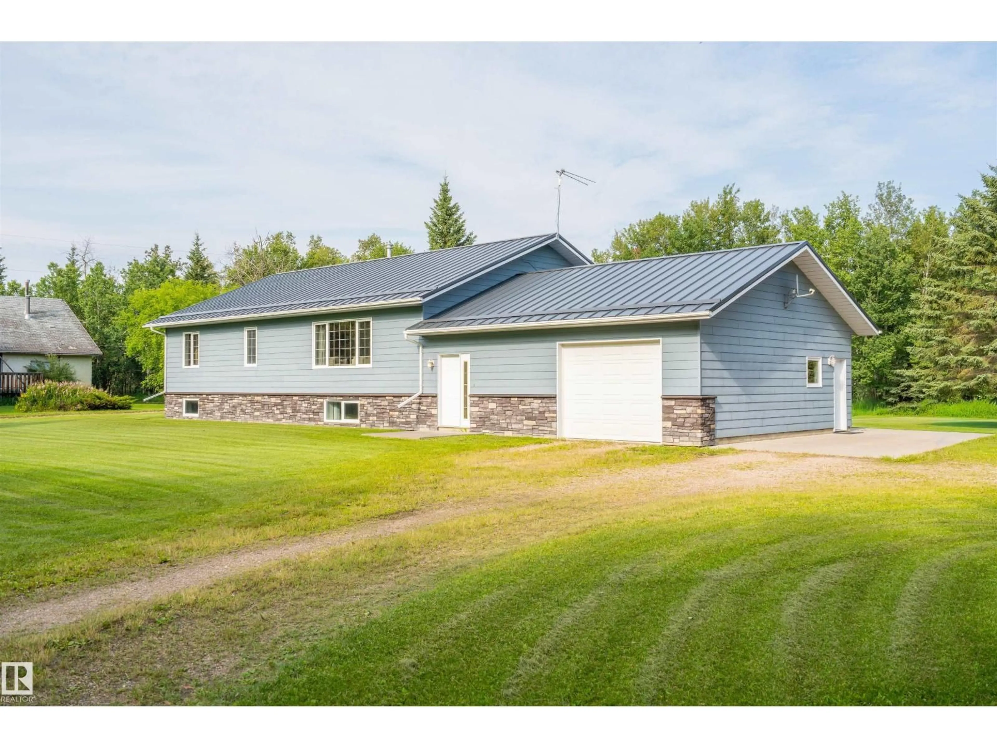A pic from outside/outdoor area/front of a property/back of a property/a pic from drone, building for 59125 RANGE ROAD 102, Rural St. Paul County Alberta T0A3A0