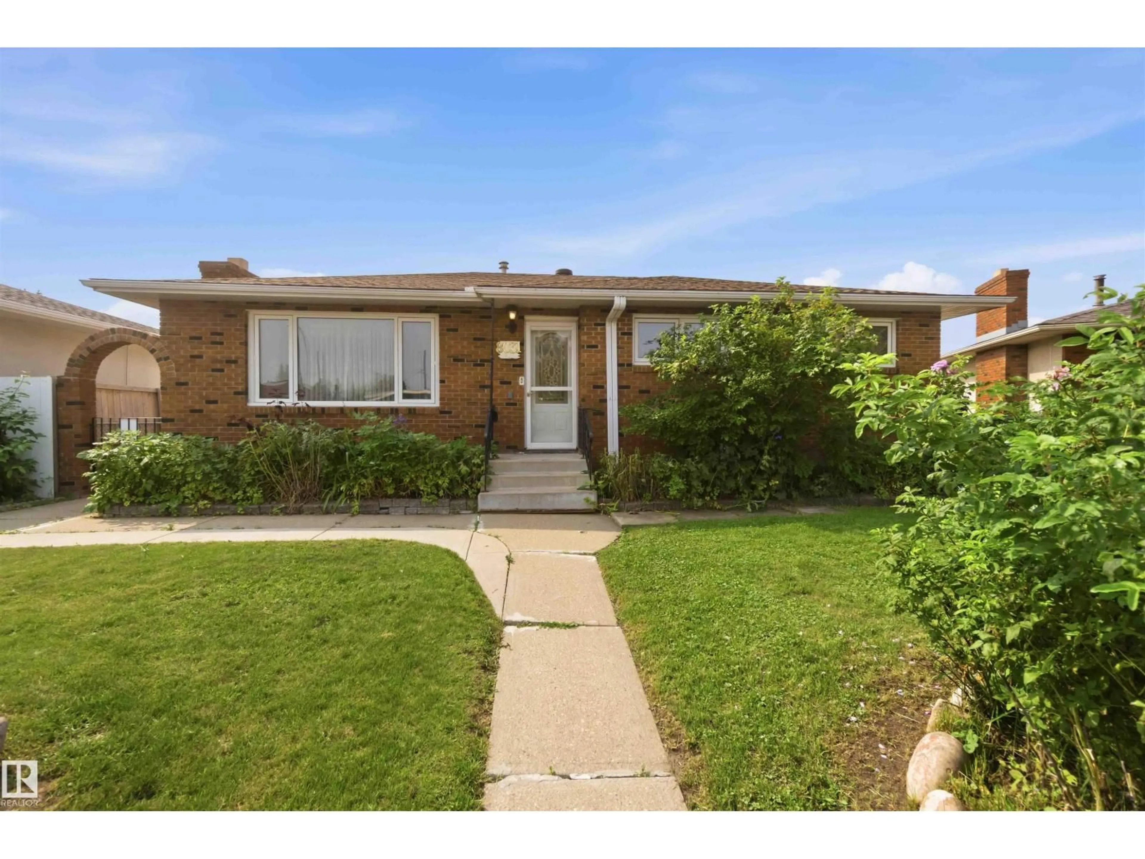 Home with brick exterior material, street for 8031 135A AV, Edmonton Alberta T5C2J6