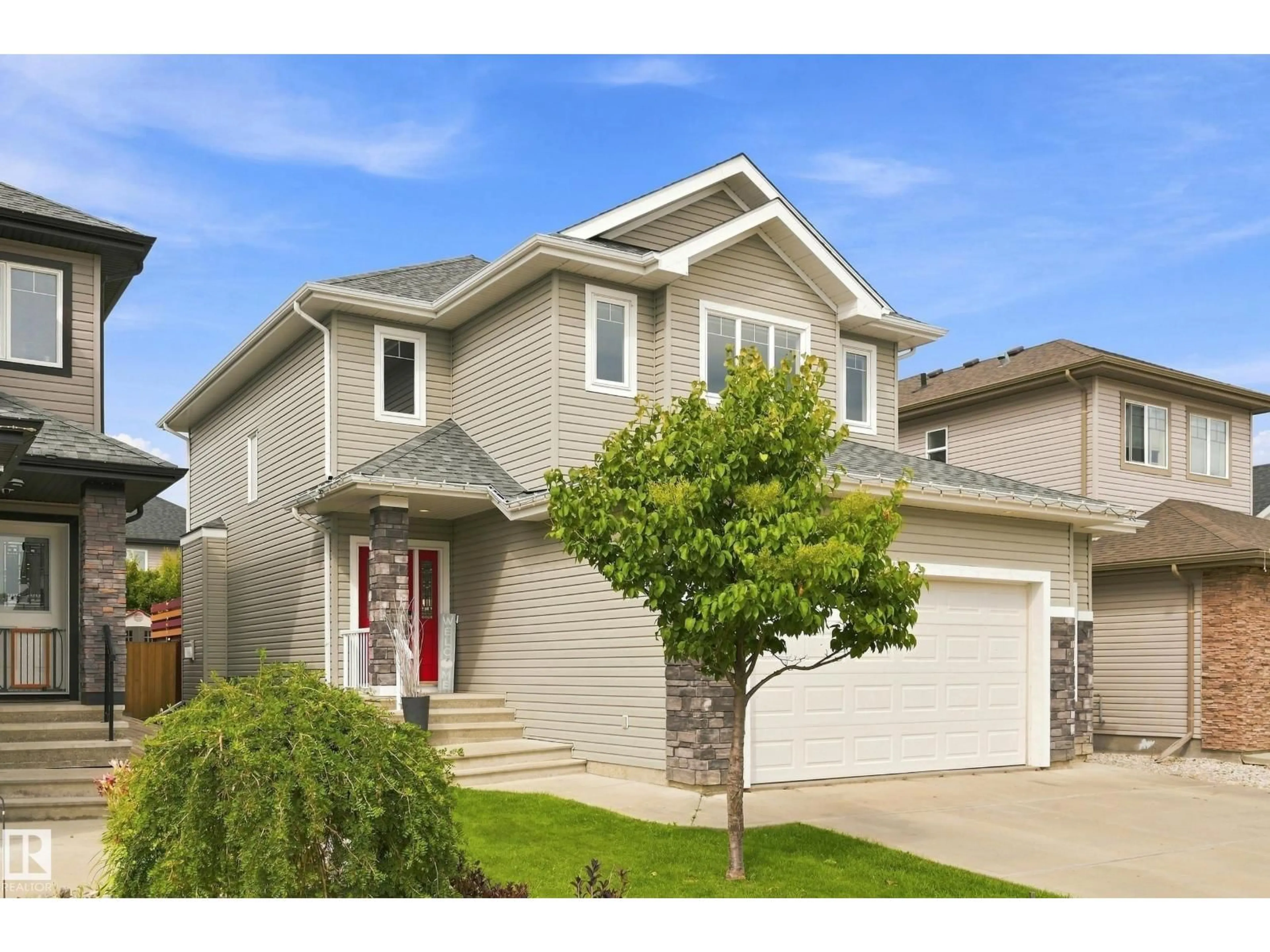 Home with vinyl exterior material, street for 14 ELLISON, Fort Saskatchewan Alberta T8L0M9