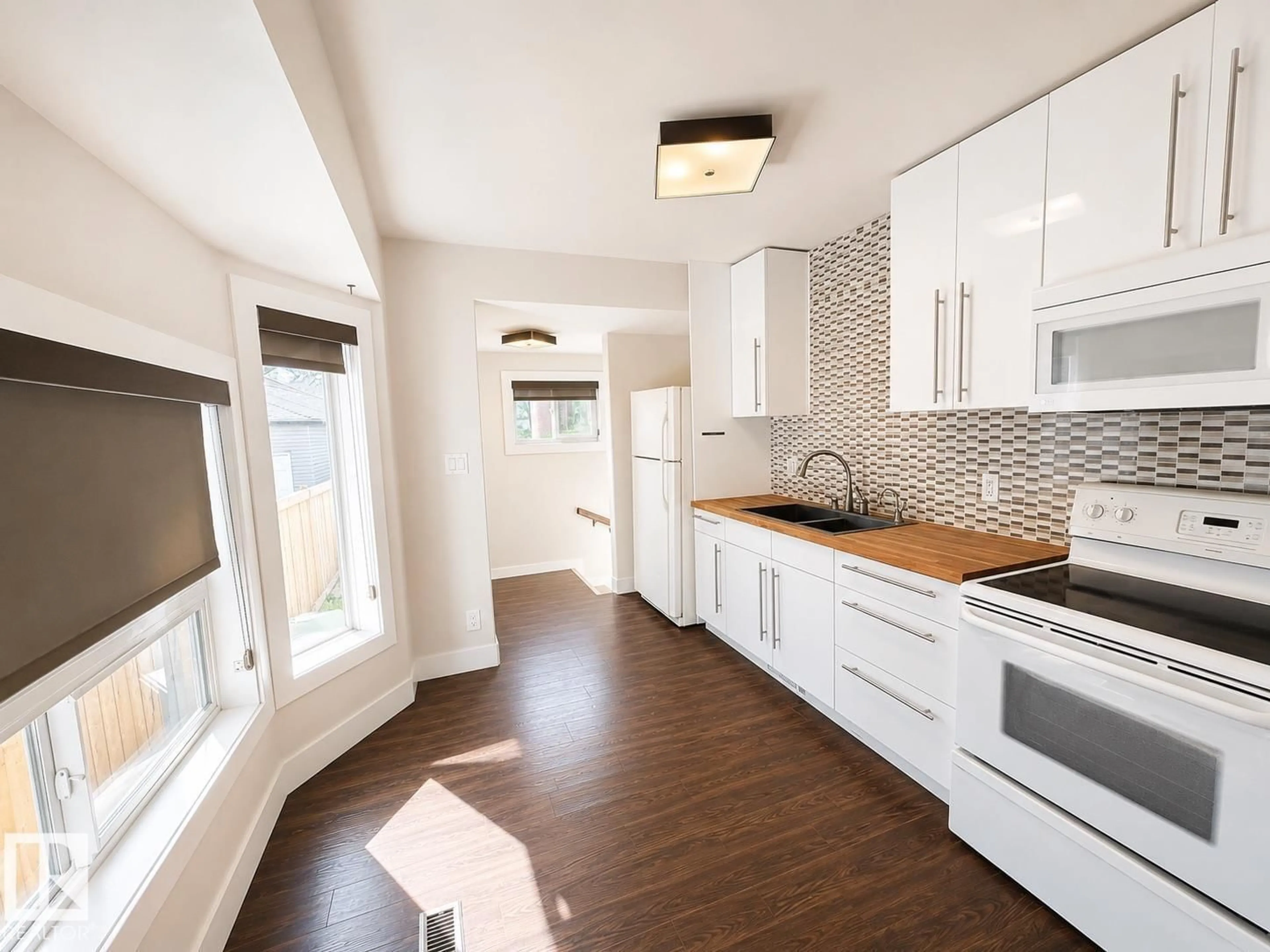 Open concept kitchen, unknown for NW - 11934 64 ST, Edmonton Alberta T5W4J3