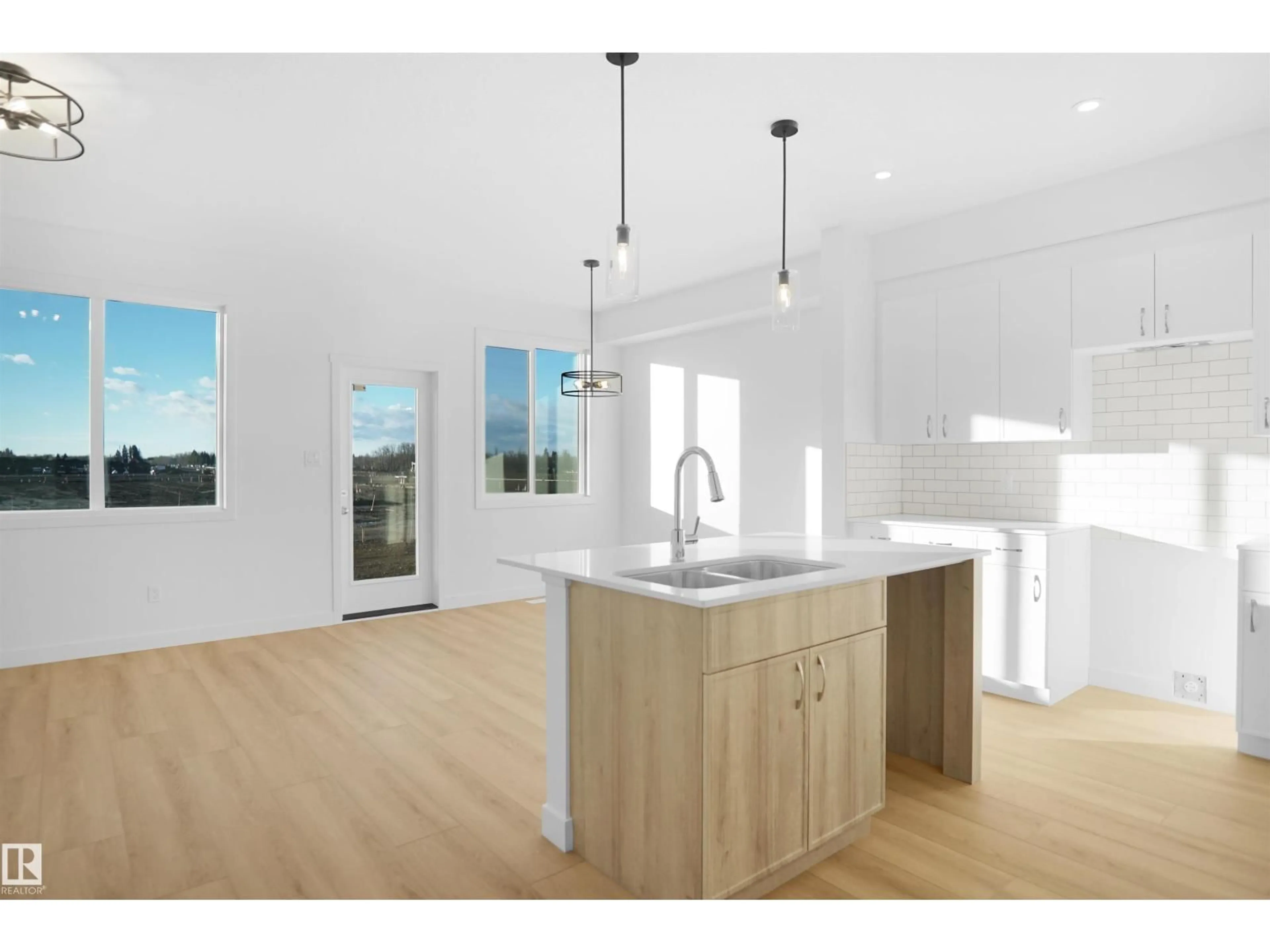 Open concept kitchen, wood/laminate floor for NW - 7243 182 AV, Edmonton Alberta T5Y4B7