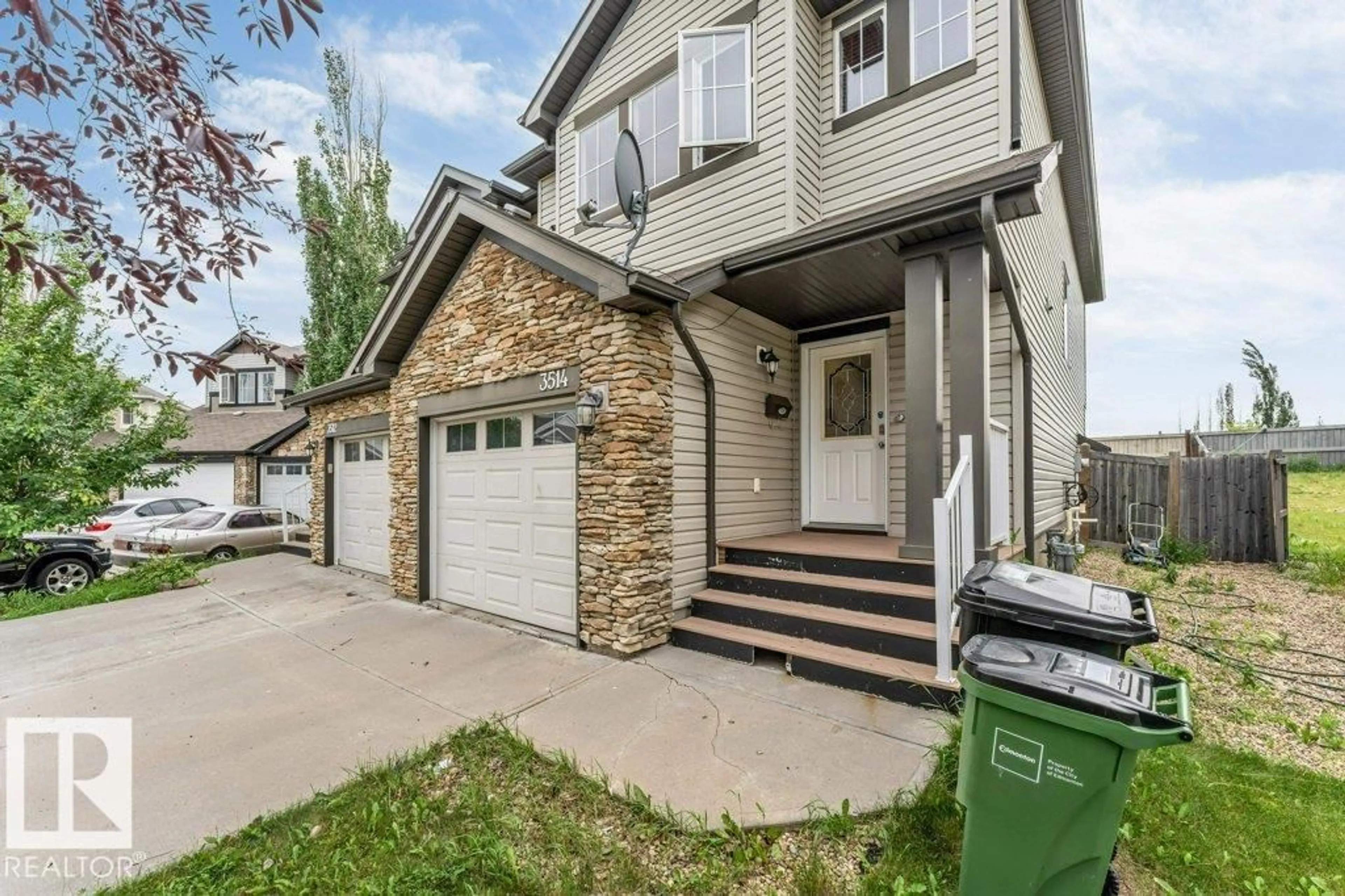 Home with vinyl exterior material, street for 3514 16 ST, Edmonton Alberta T6T0M6