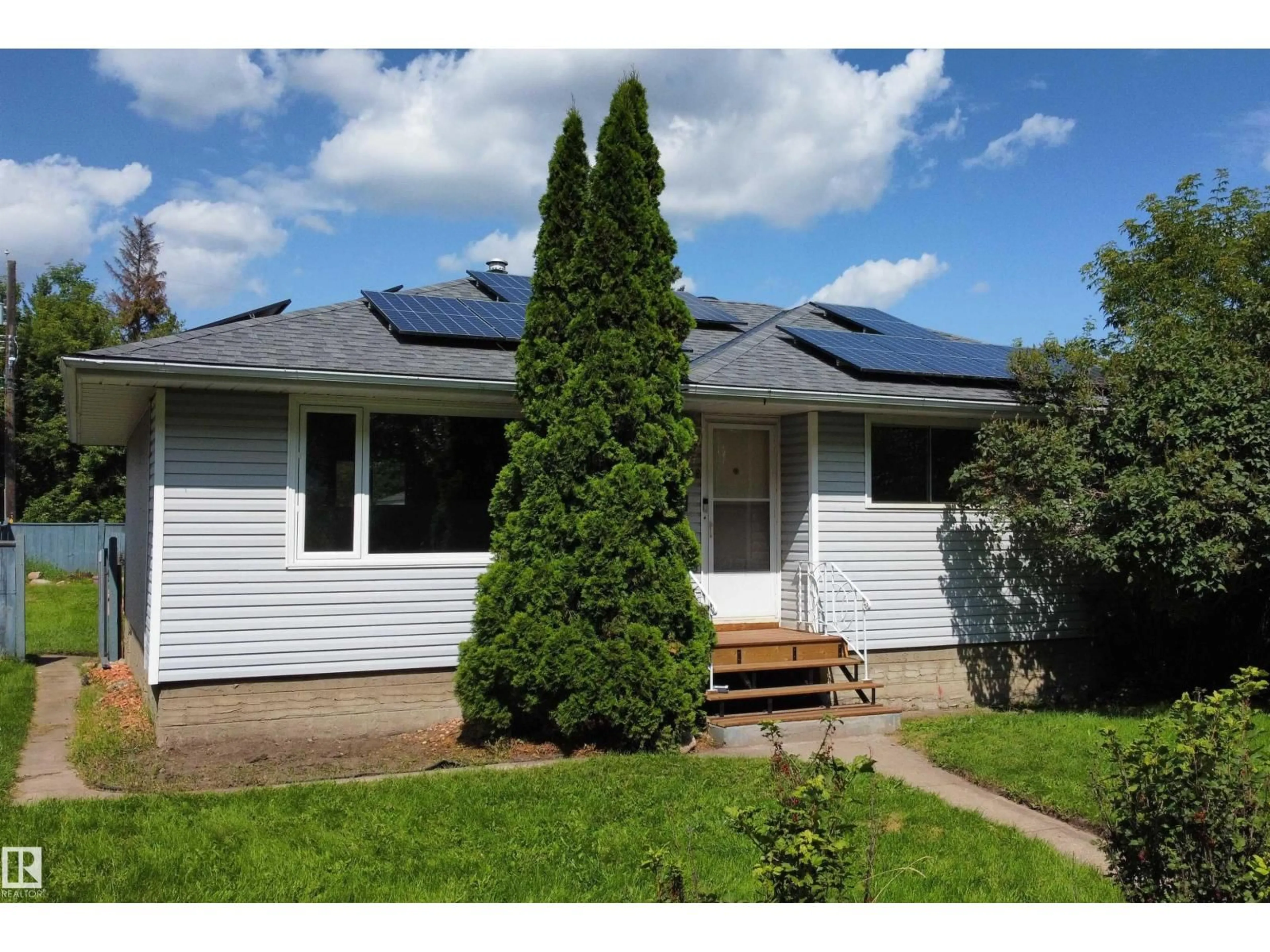 Home with vinyl exterior material, street for 3822 114 AV, Edmonton Alberta T5W0S6