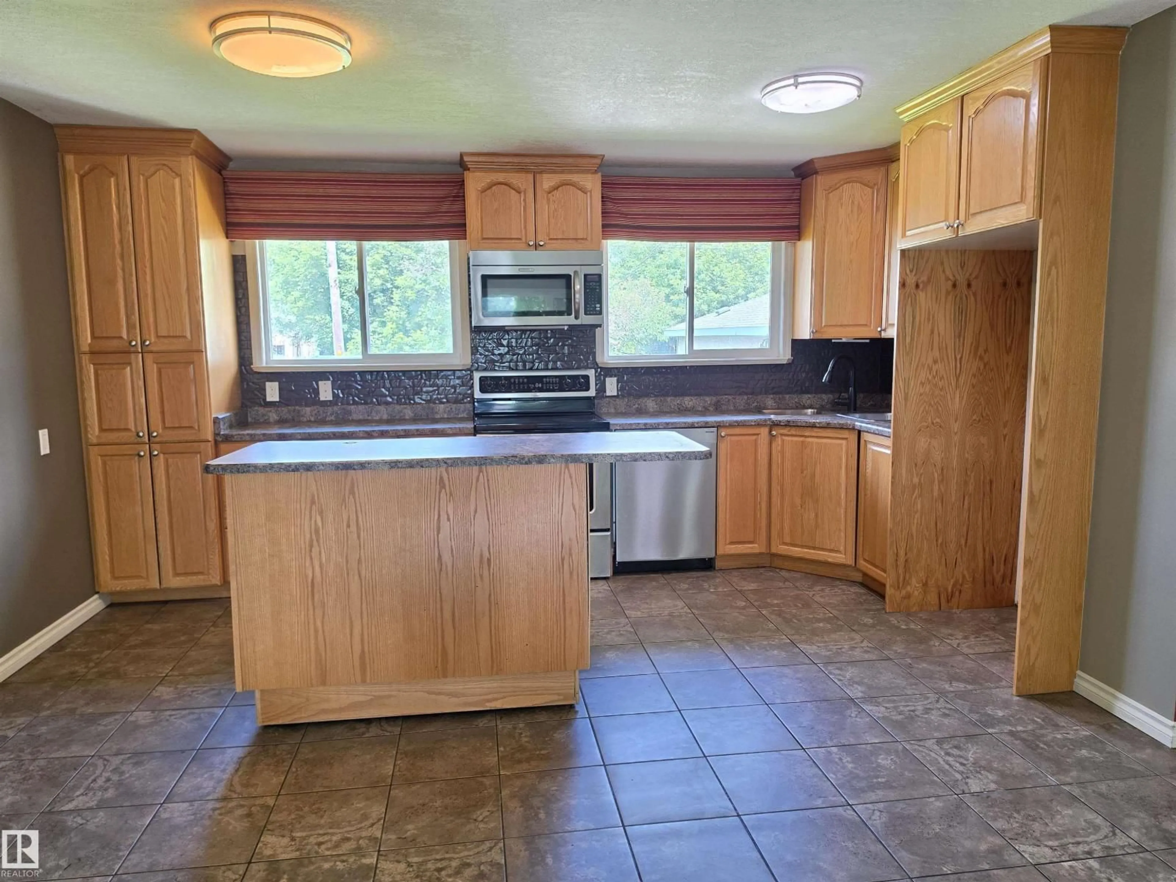 Standard kitchen, ceramic/tile floor for 3822 114 AV, Edmonton Alberta T5W0S6