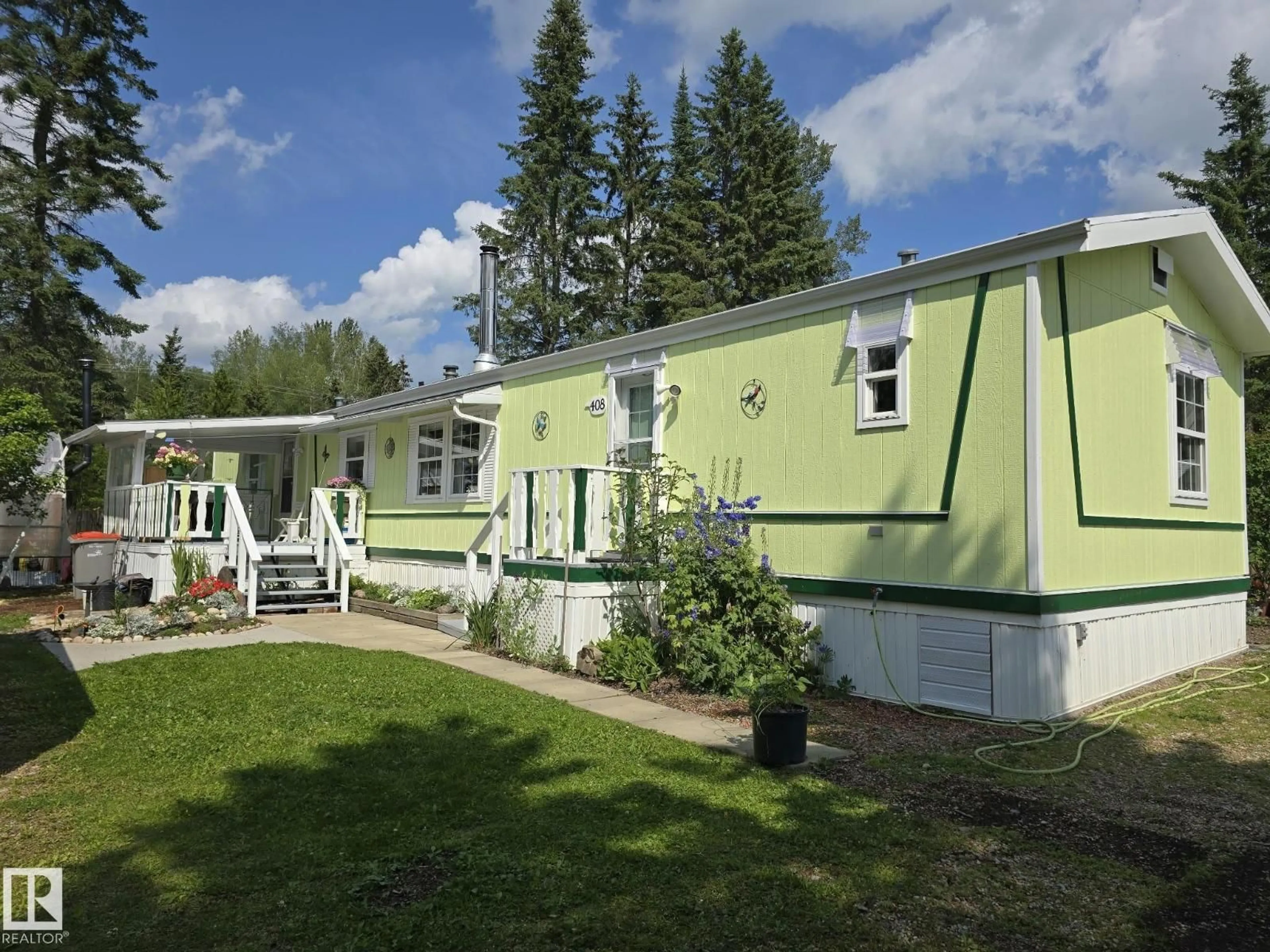 Home with vinyl exterior material, mountain view for 408 3 ST, Winfield Alberta T0C2X0