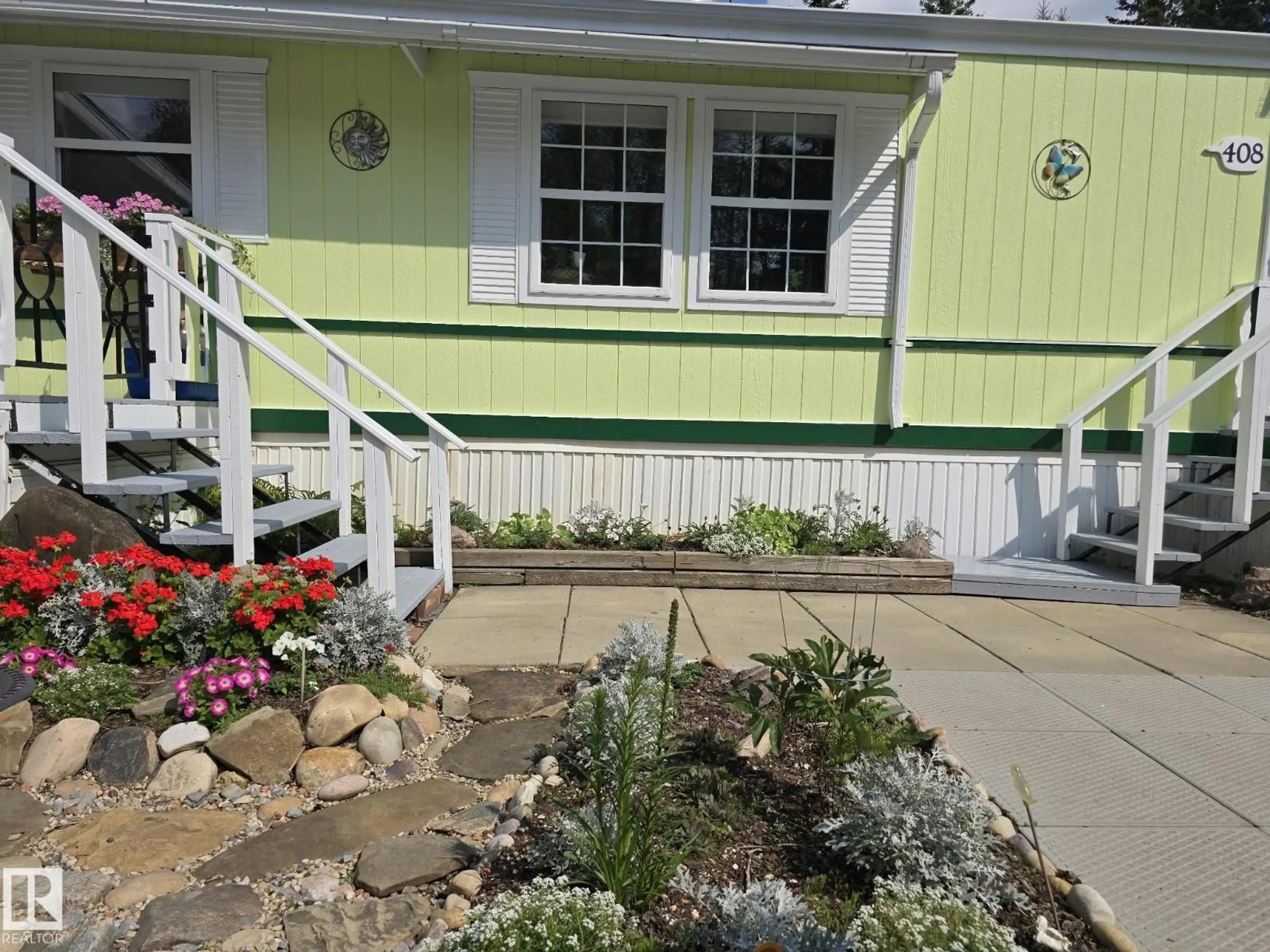 Home with vinyl exterior material, street for 408 3 ST, Winfield Alberta T0C2X0