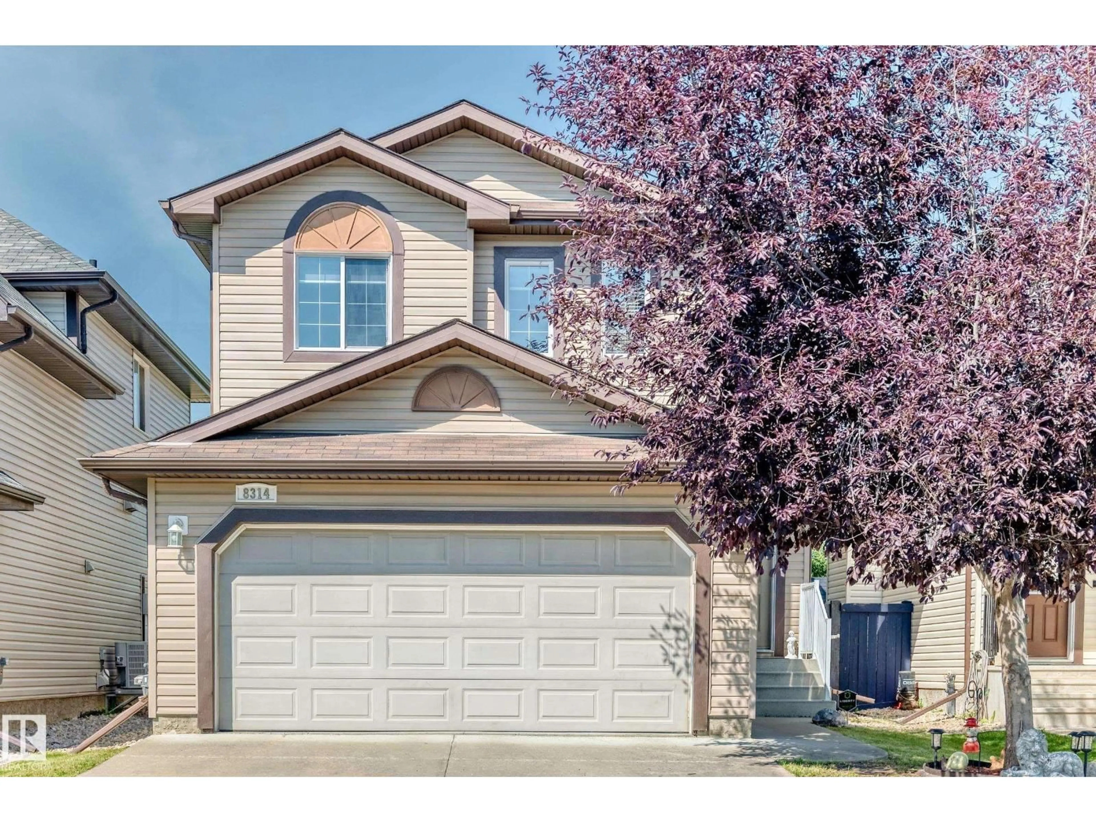 Home with vinyl exterior material, street for 8314 180A AV, Edmonton Alberta T5Z0H8