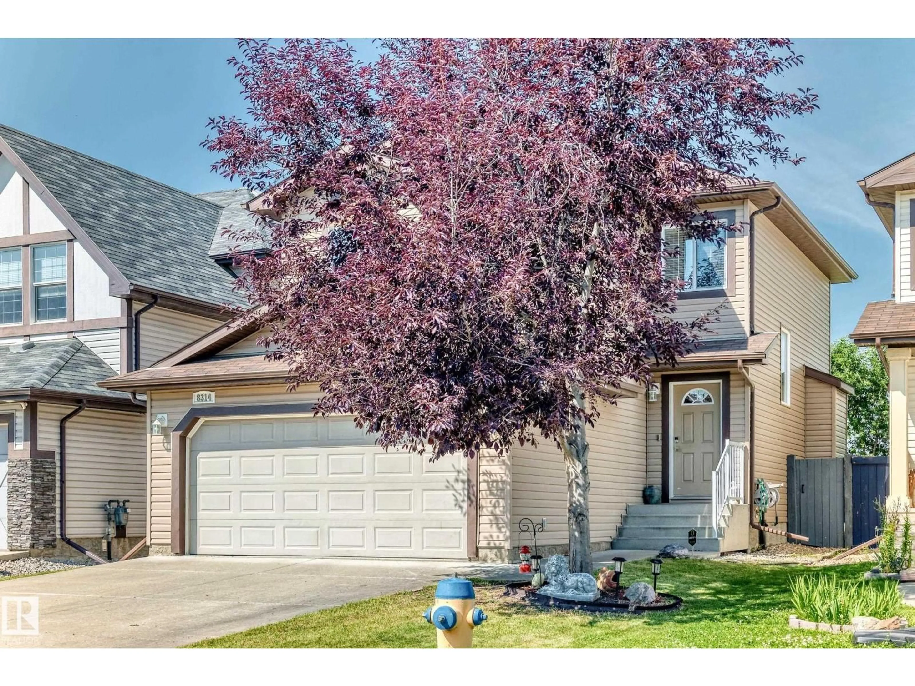 Home with vinyl exterior material, street for 8314 180A AV, Edmonton Alberta T5Z0H8