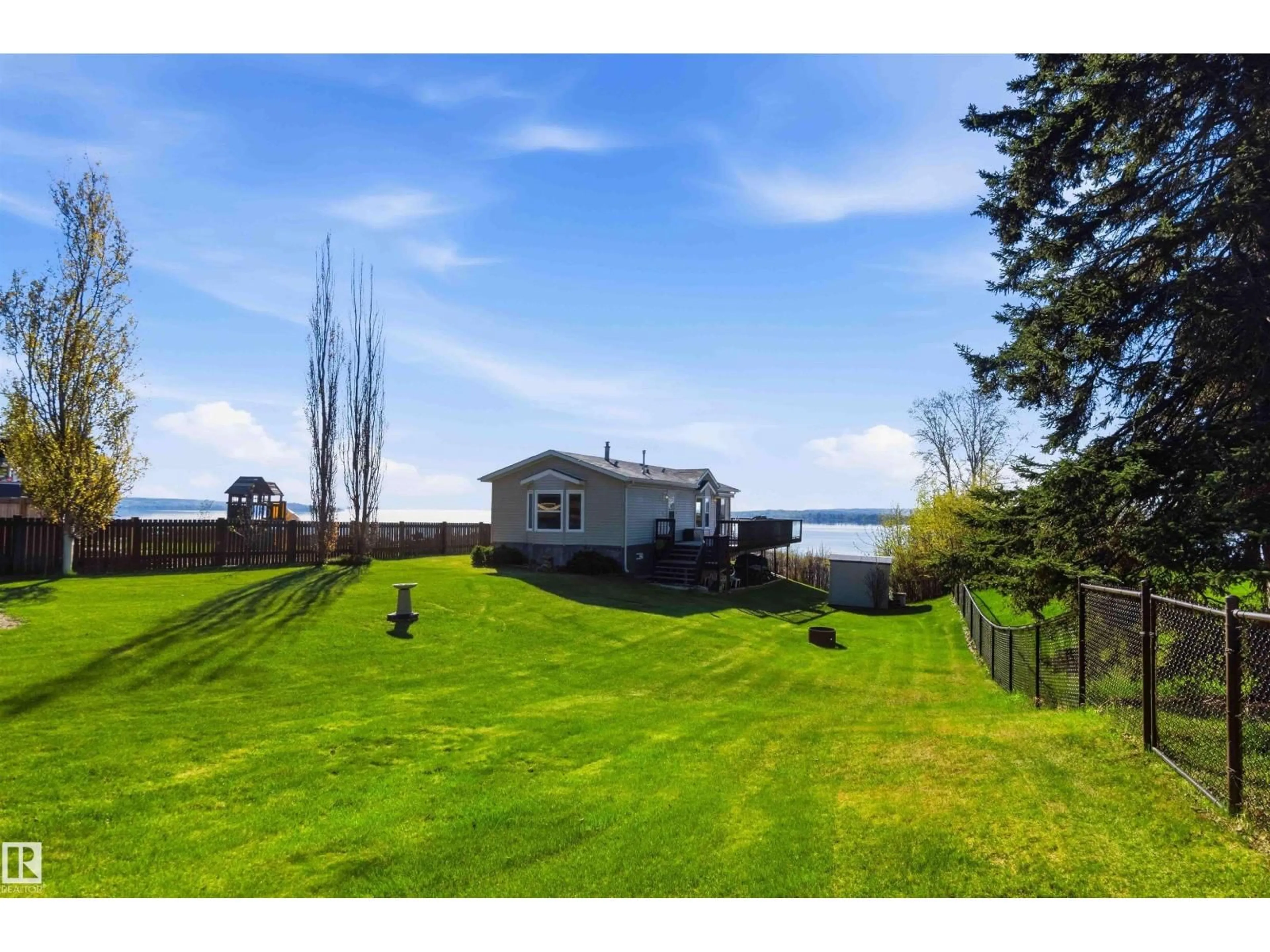 A pic from outside/outdoor area/front of a property/back of a property/a pic from drone, water/lake/river/ocean view for 53117 - 7 HWY 31, Rural Parkland County Alberta T0E2B0