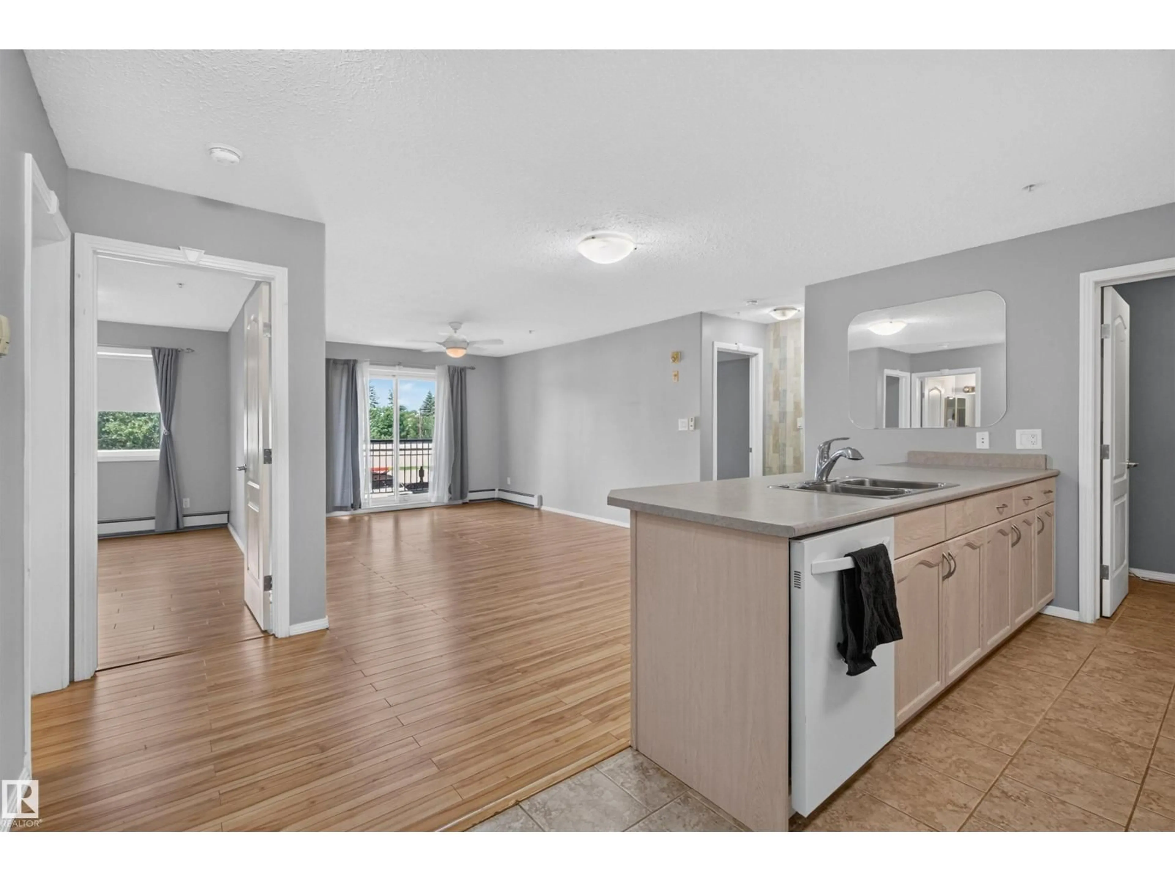 Open concept kitchen, unknown for 592 - 236 HOOKE RD, Edmonton Alberta T5A5H2