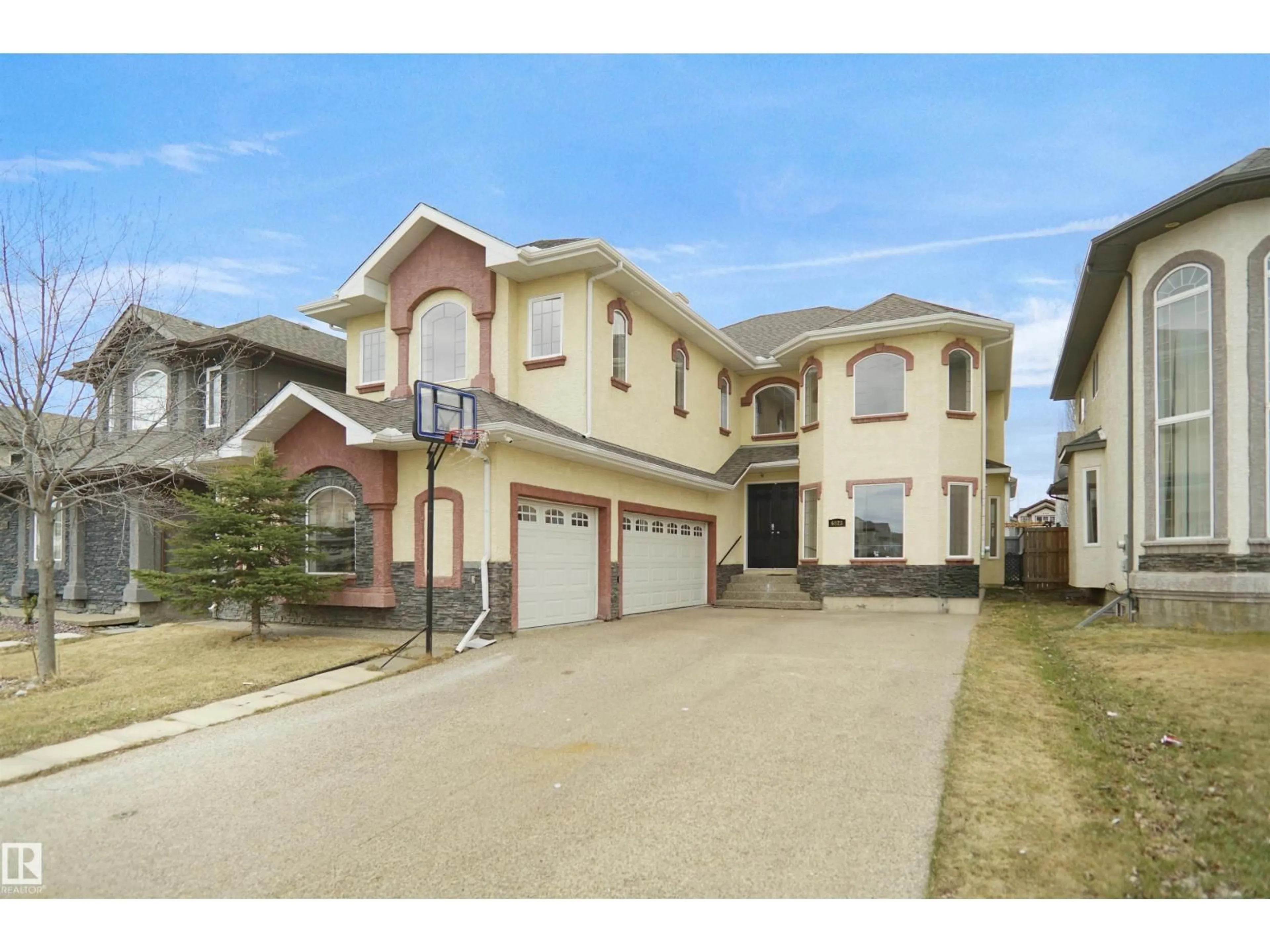 Home with vinyl exterior material, street for SW - 6823 18 AV, Edmonton Alberta T6X0C9