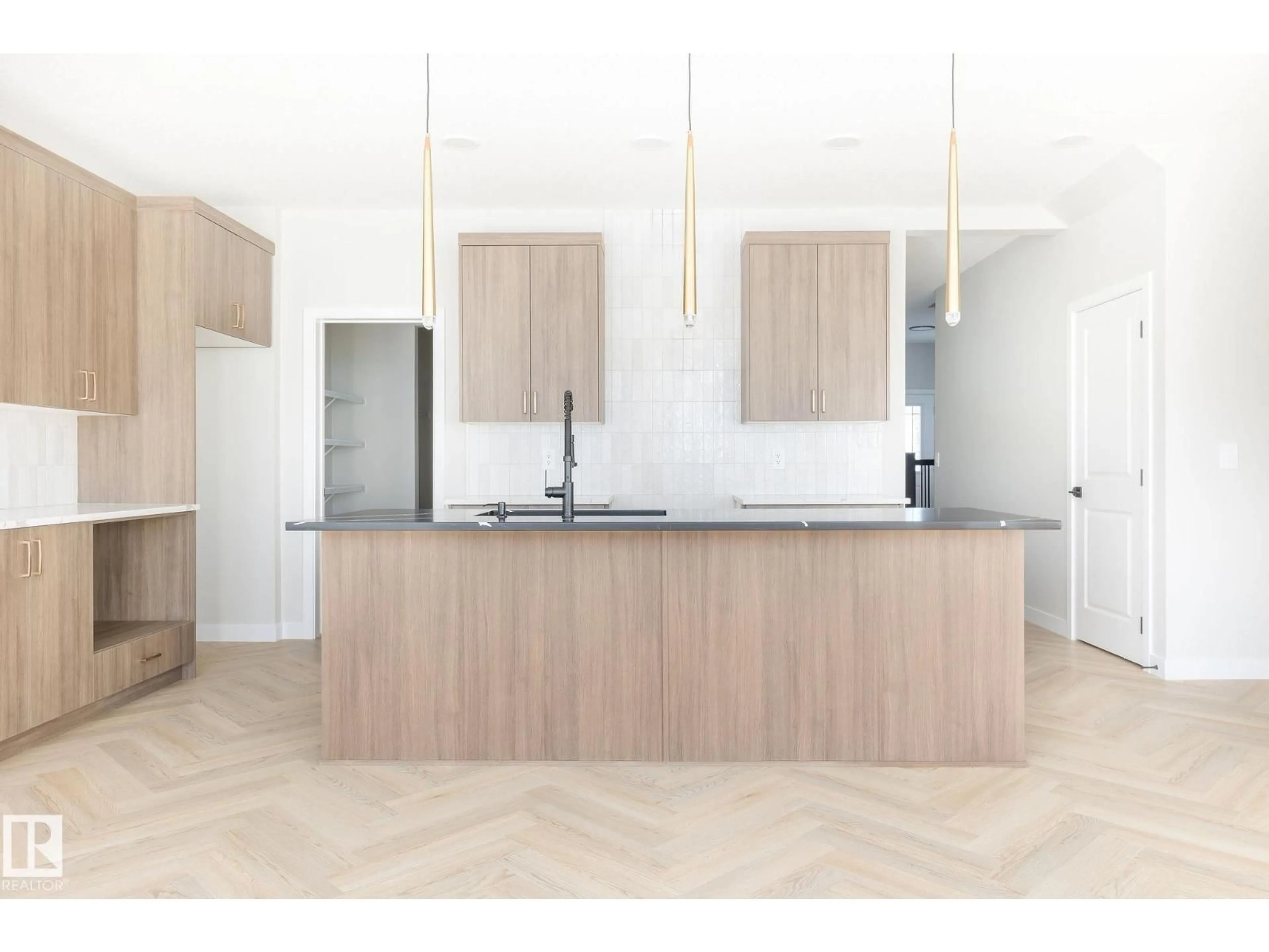 Open concept kitchen, wood/laminate floor for 24 CLICHY CL, St. Albert Alberta T8T2E4