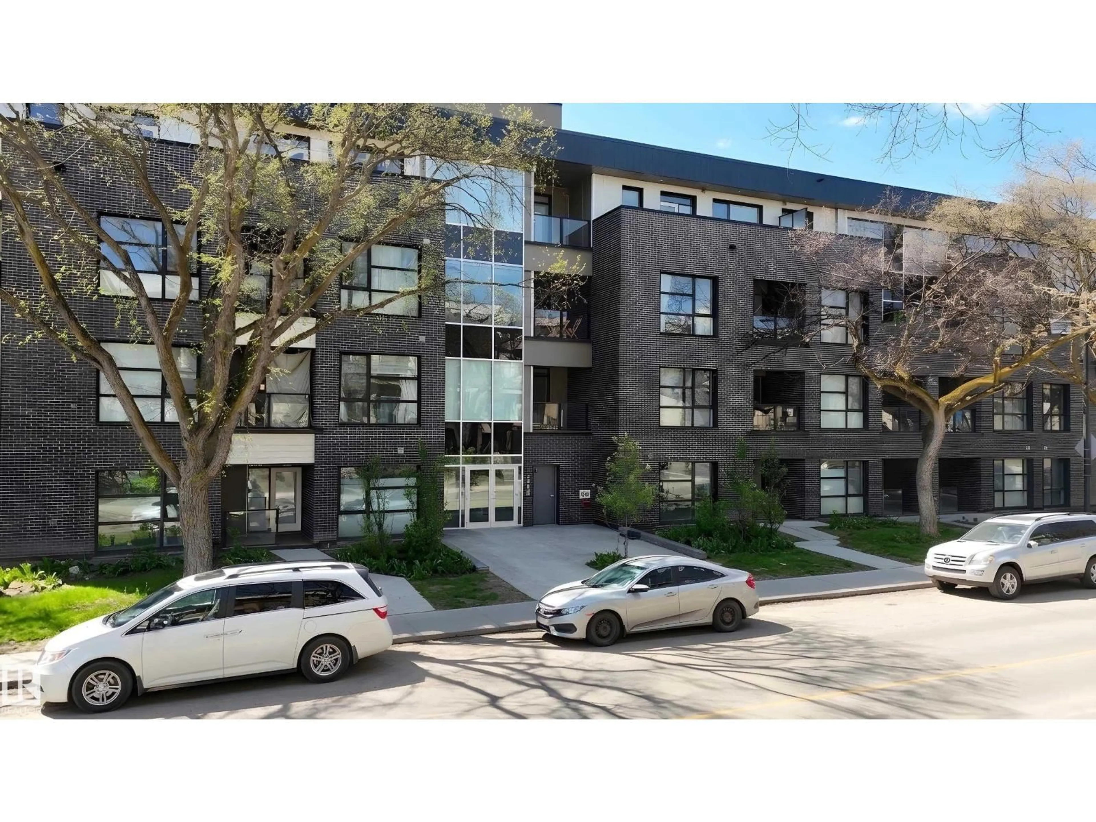 A pic from outside/outdoor area/front of a property/back of a property/a pic from drone, street for #310 - 11503 76 AV, Edmonton Alberta T6G0K6