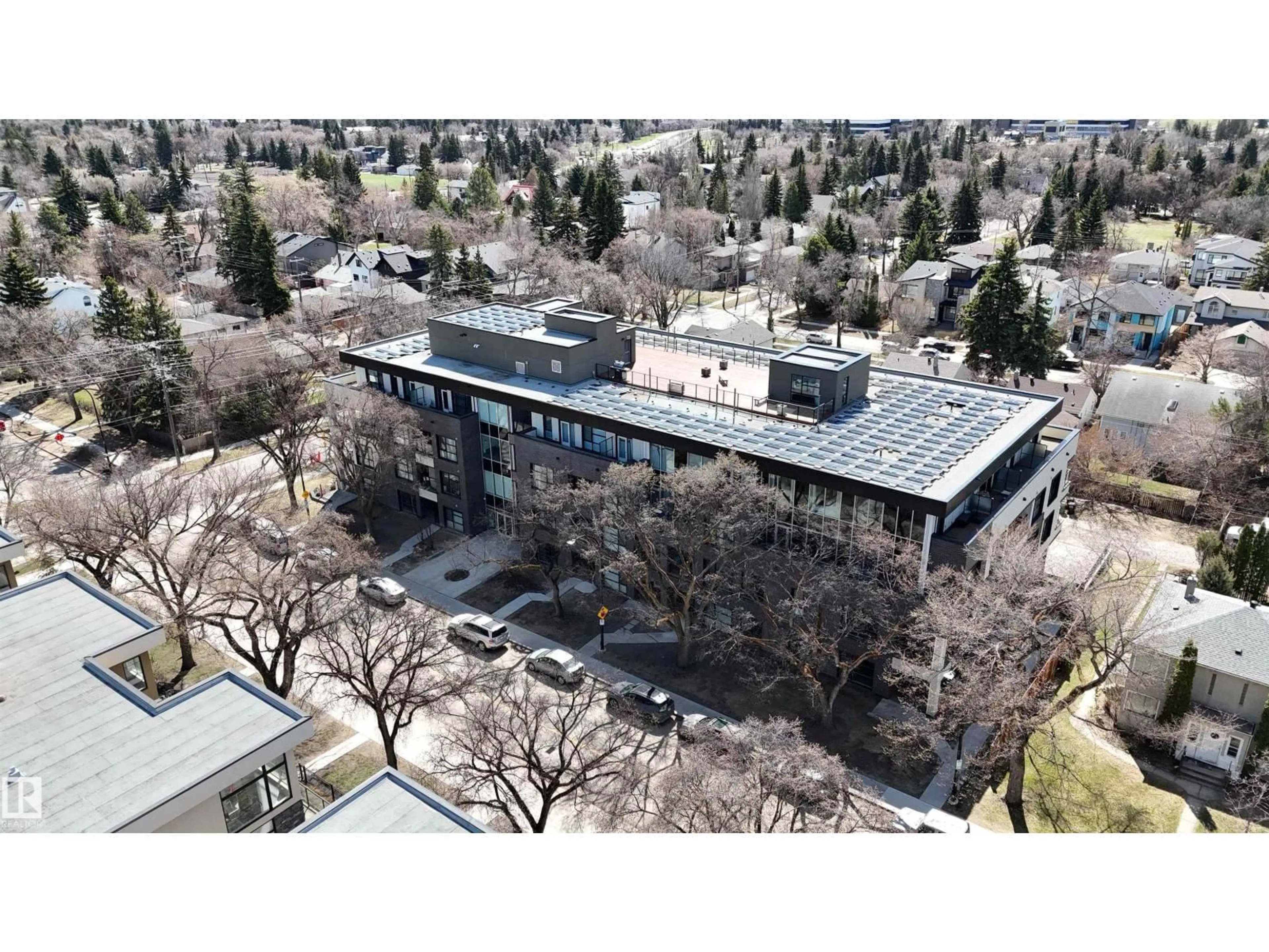 A pic from outside/outdoor area/front of a property/back of a property/a pic from drone, building for #310 - 11503 76 AV, Edmonton Alberta T6G0K6