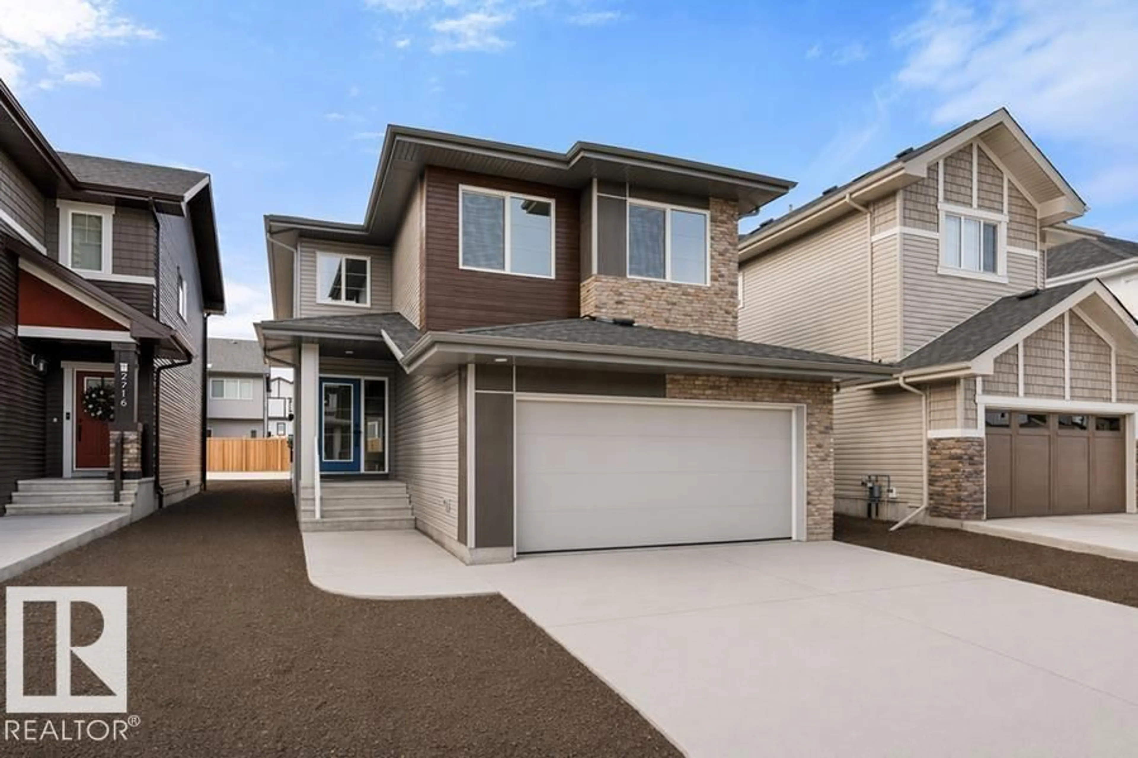 Home with vinyl exterior material, street for NW - 2720 194 ST, Edmonton Alberta T6M3B1