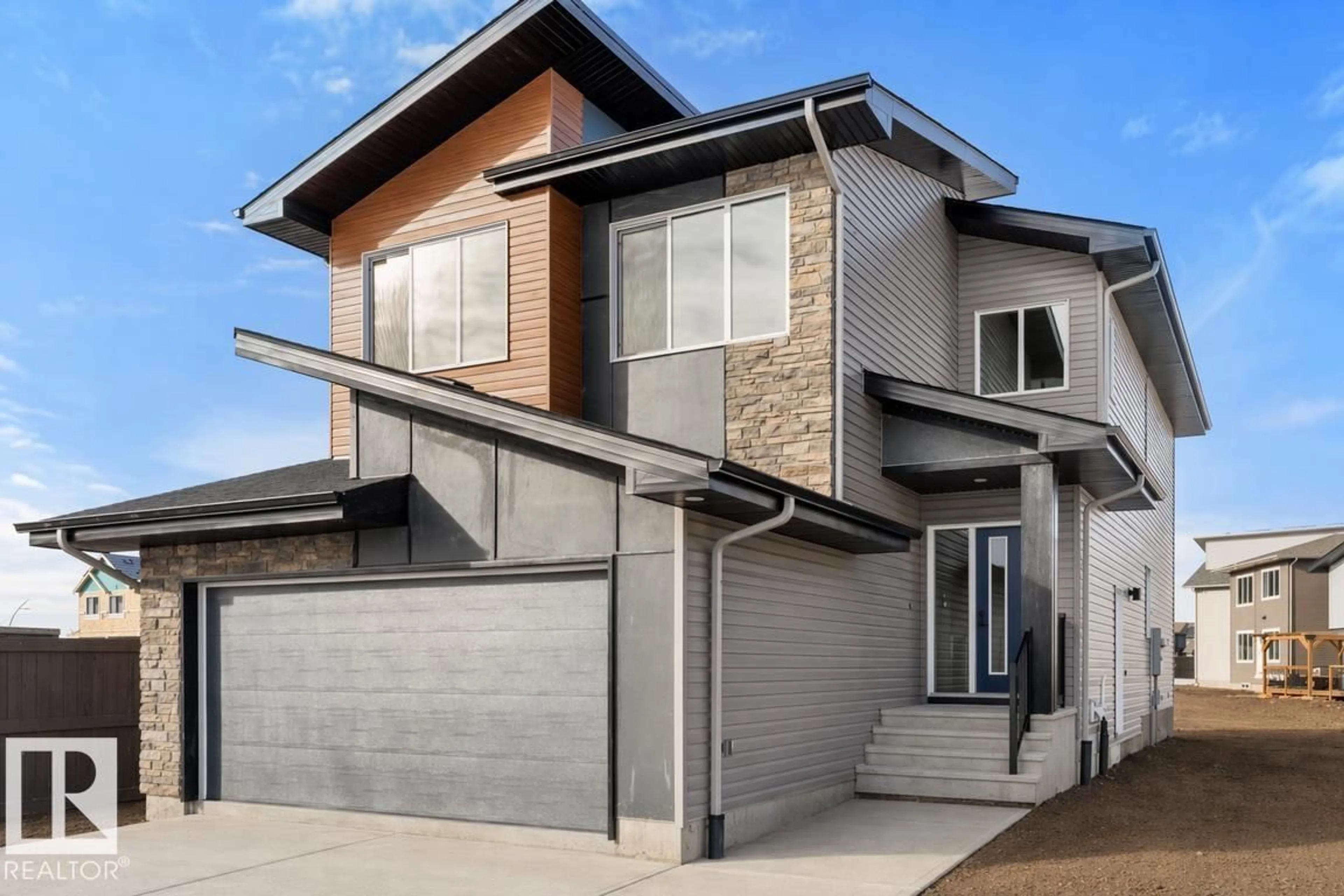 Home with vinyl exterior material, street for NW - 19428 25 AV, Edmonton Alberta T6M1P5