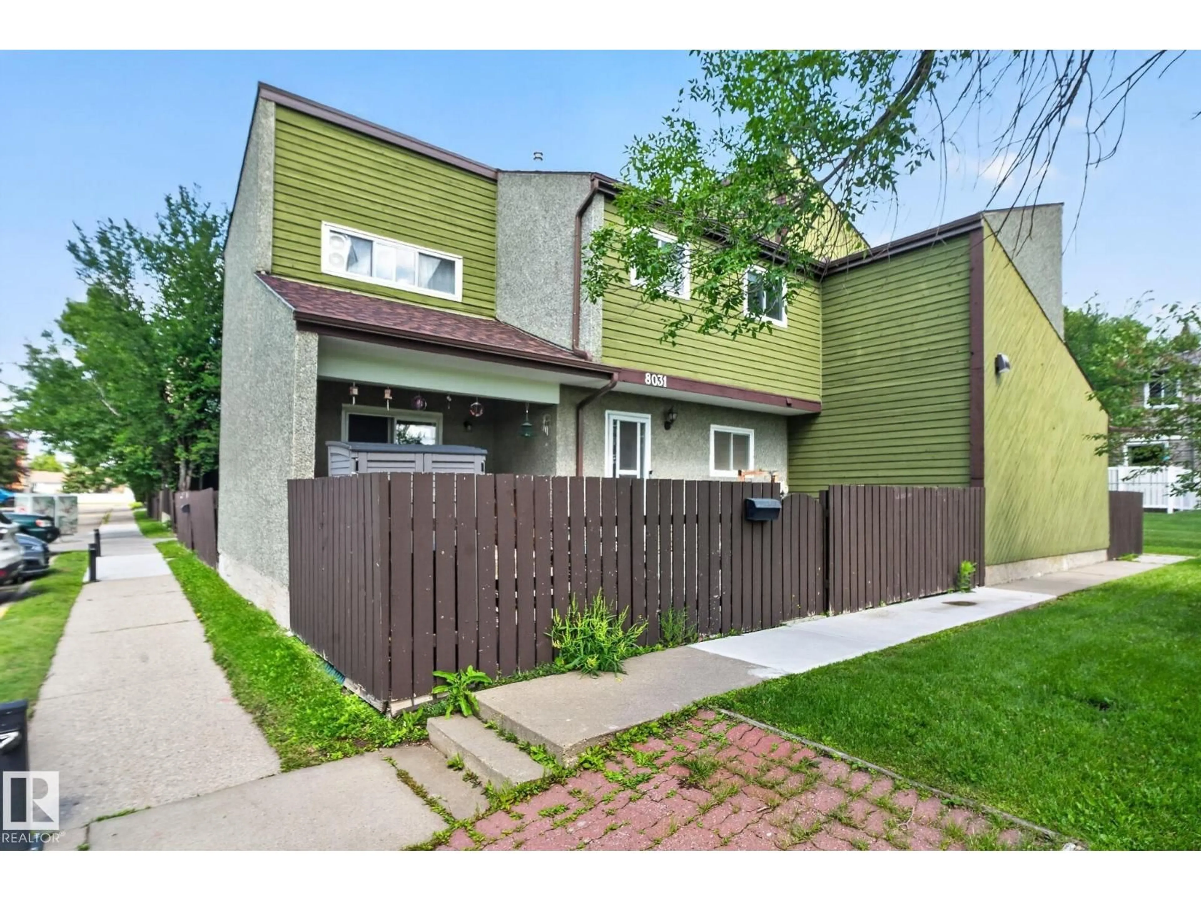 Home with vinyl exterior material, street for 8031 27 AV, Edmonton Alberta T6K3C9