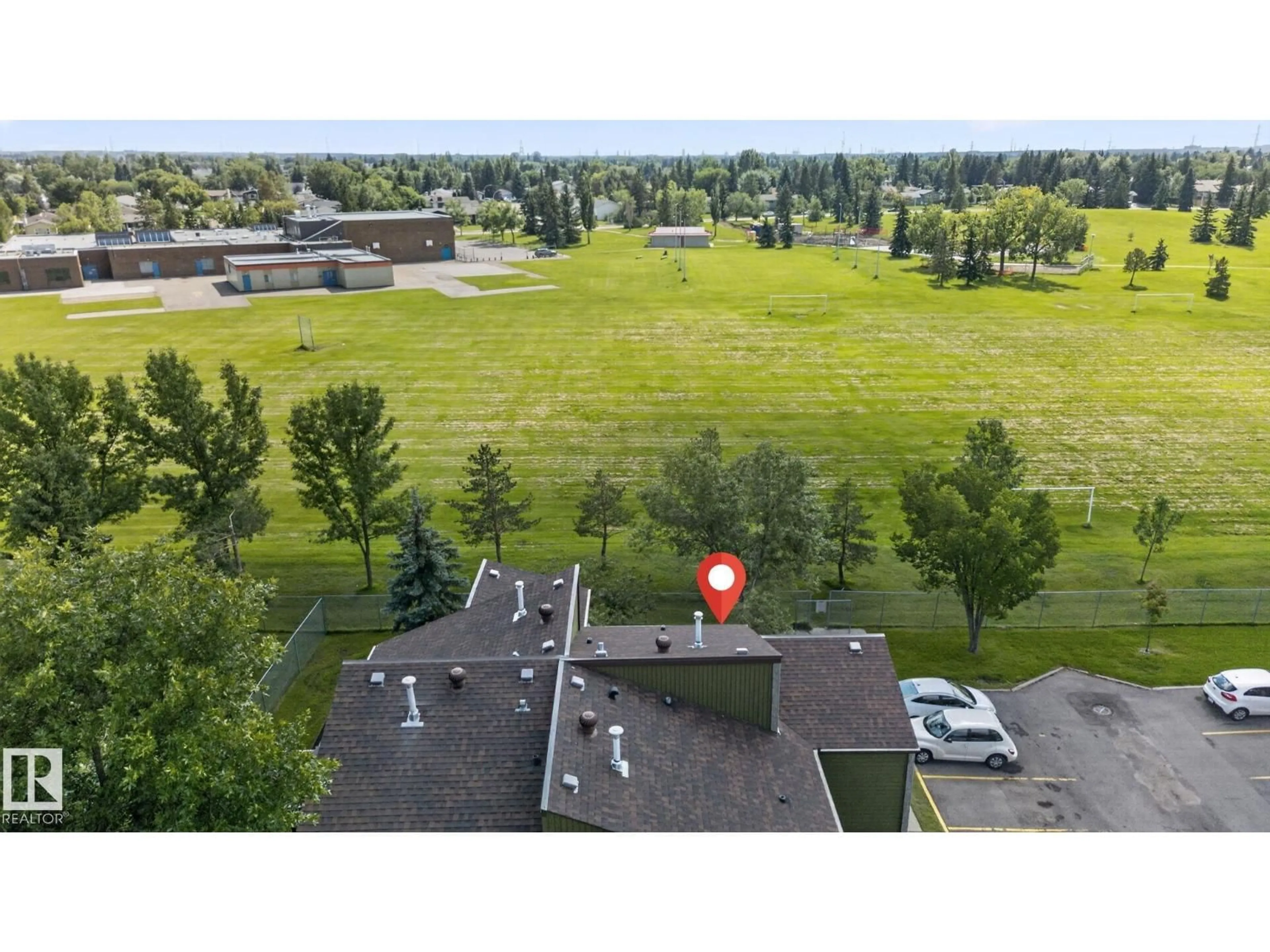 A pic from outside/outdoor area/front of a property/back of a property/a pic from drone, mountain view for 8031 27 AV, Edmonton Alberta T6K3C9