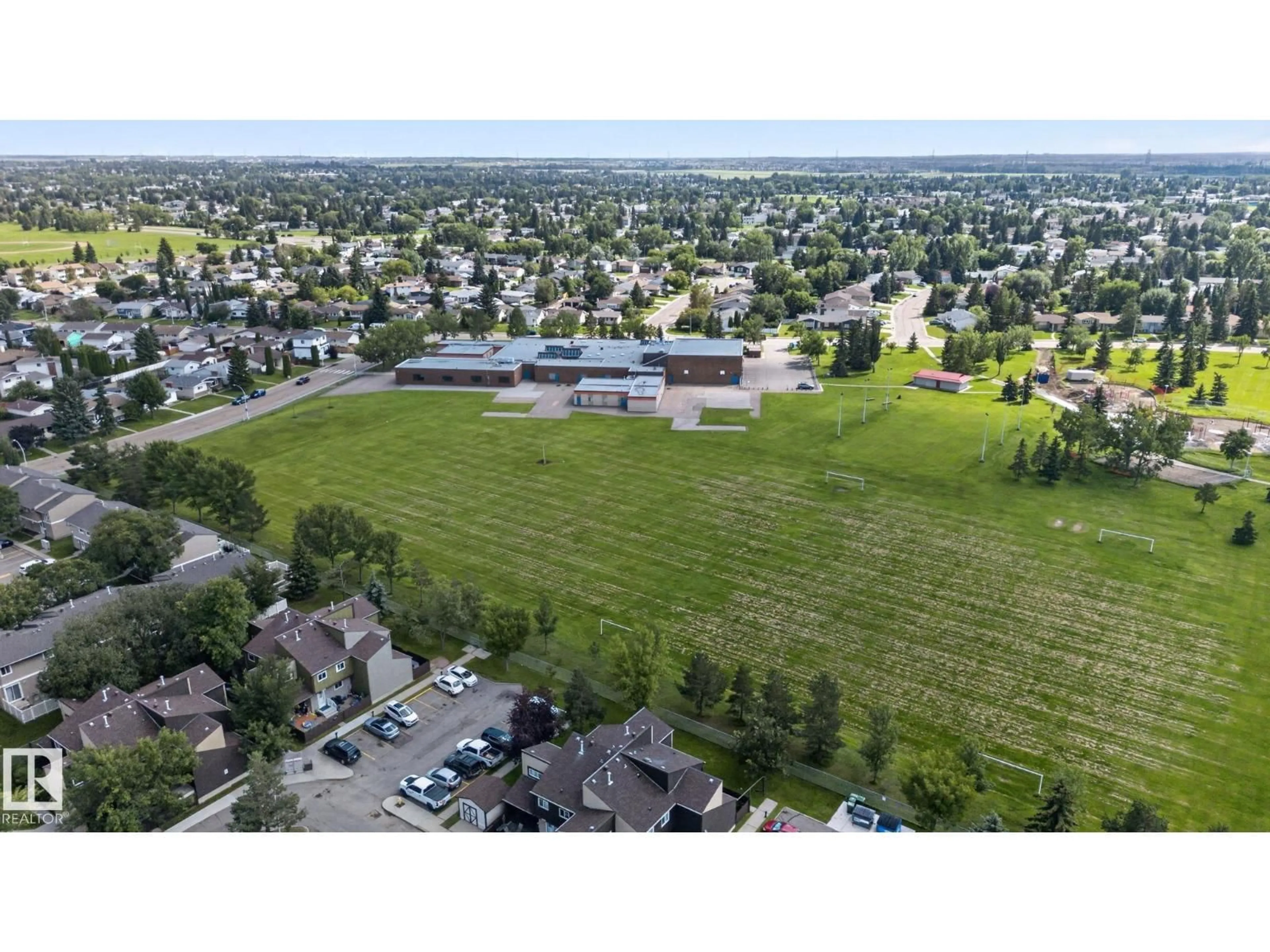 A pic from outside/outdoor area/front of a property/back of a property/a pic from drone, mountain view for 8031 27 AV, Edmonton Alberta T6K3C9