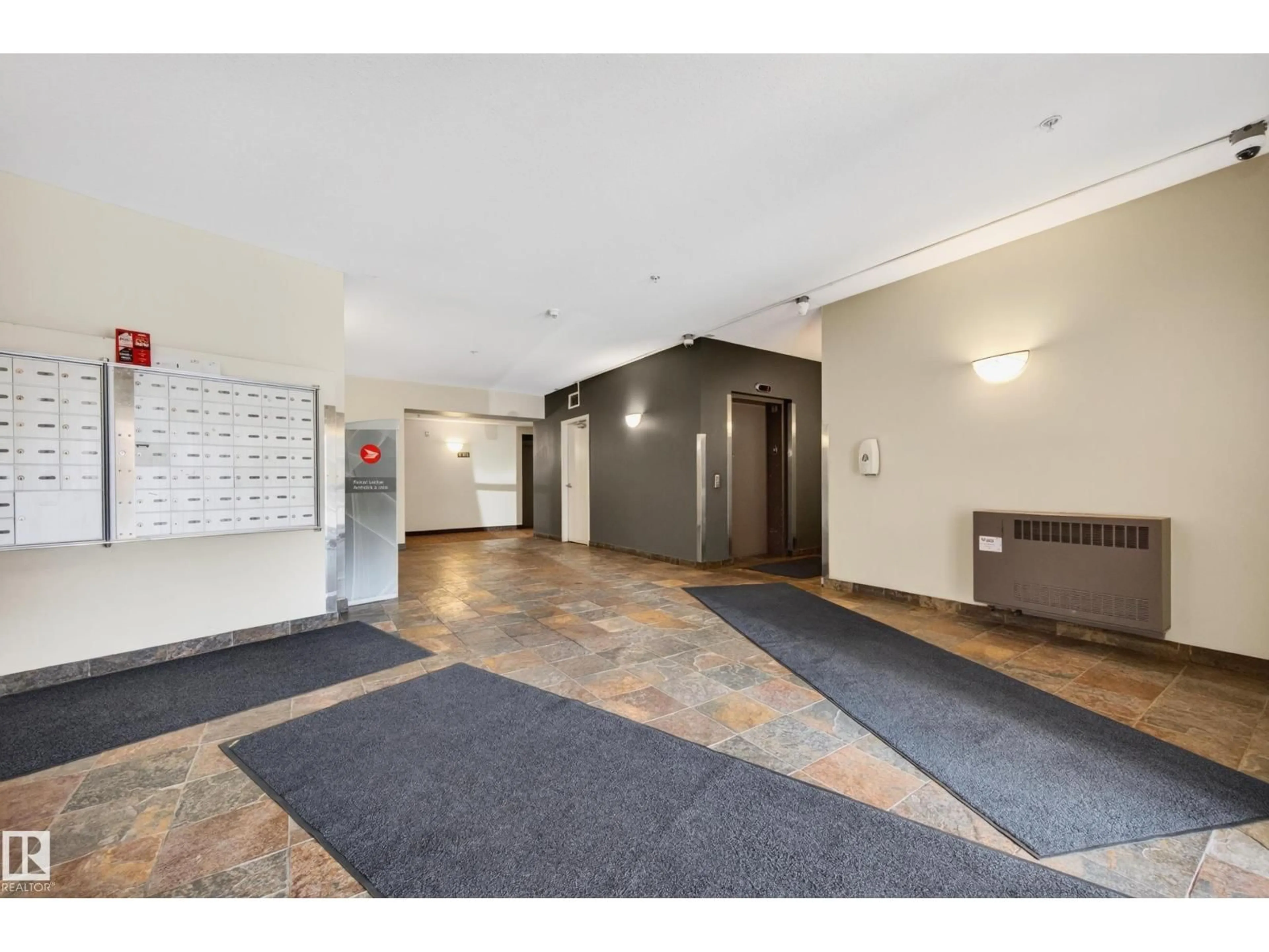 Indoor foyer for #211 - 4316 139 AV, Edmonton Alberta T5Y0L1