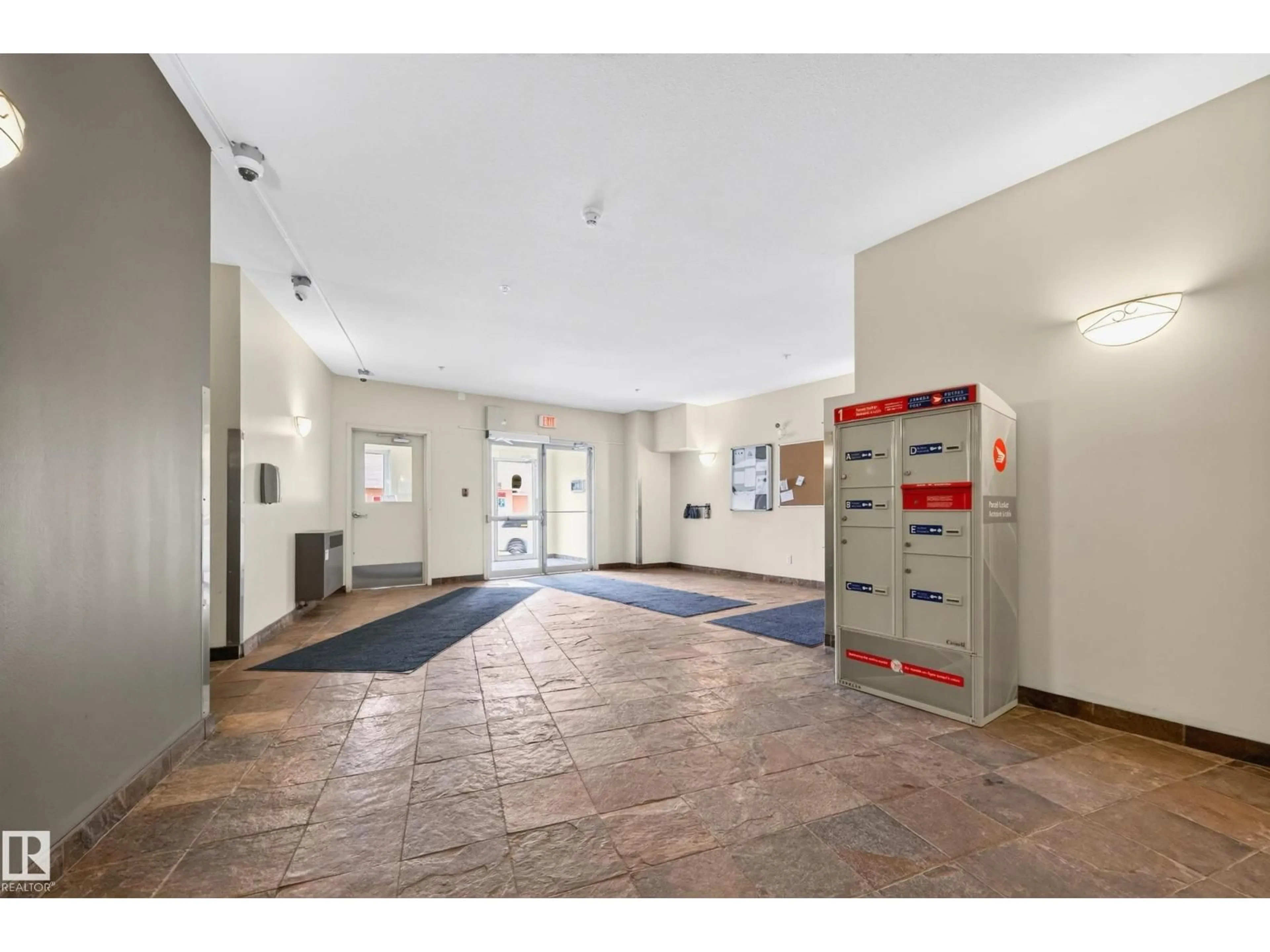 Indoor foyer for #211 - 4316 139 AV, Edmonton Alberta T5Y0L1