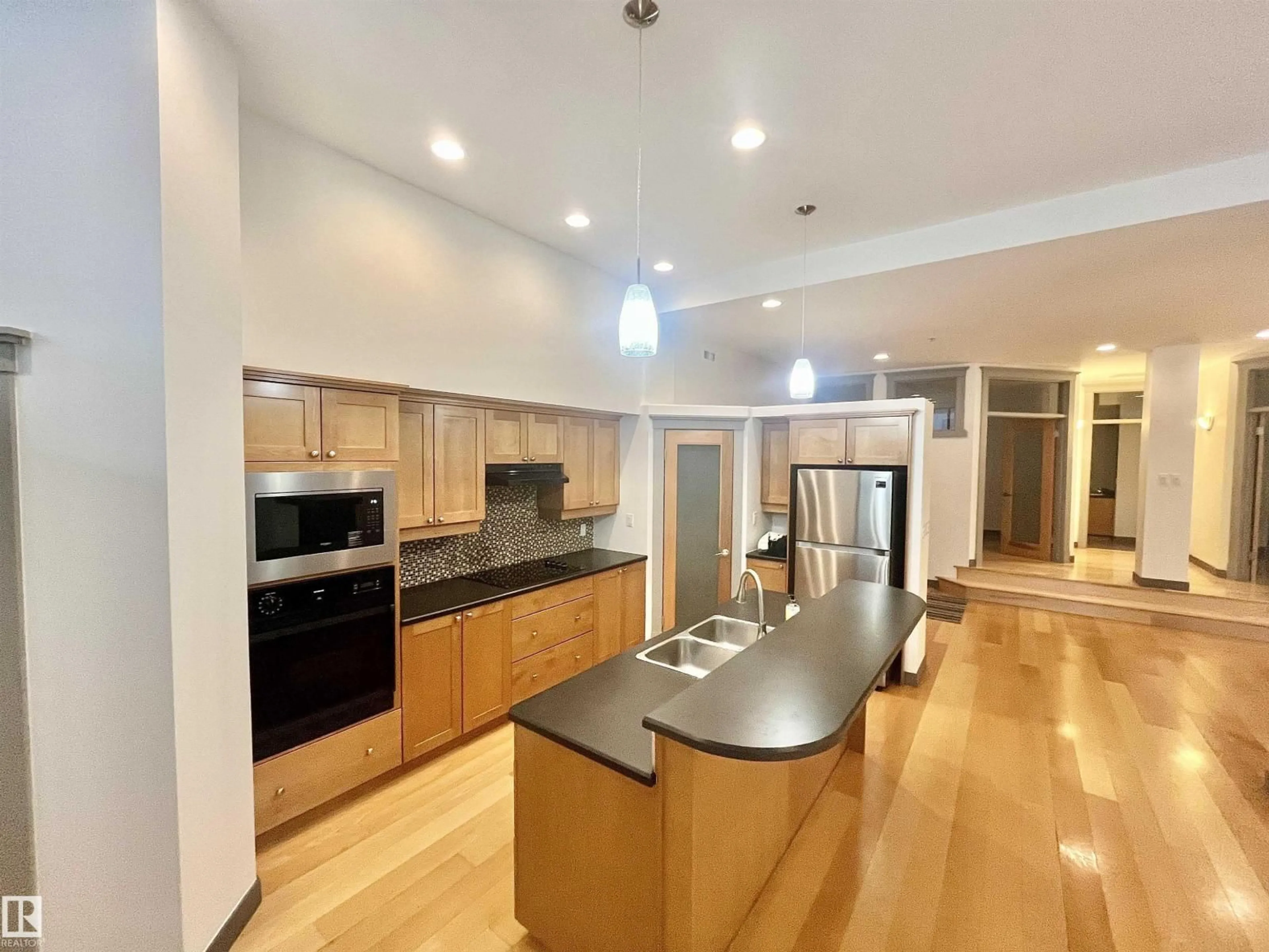 Open concept kitchen, unknown for #212 - 10009 102 AV, Edmonton Alberta T5J5B6