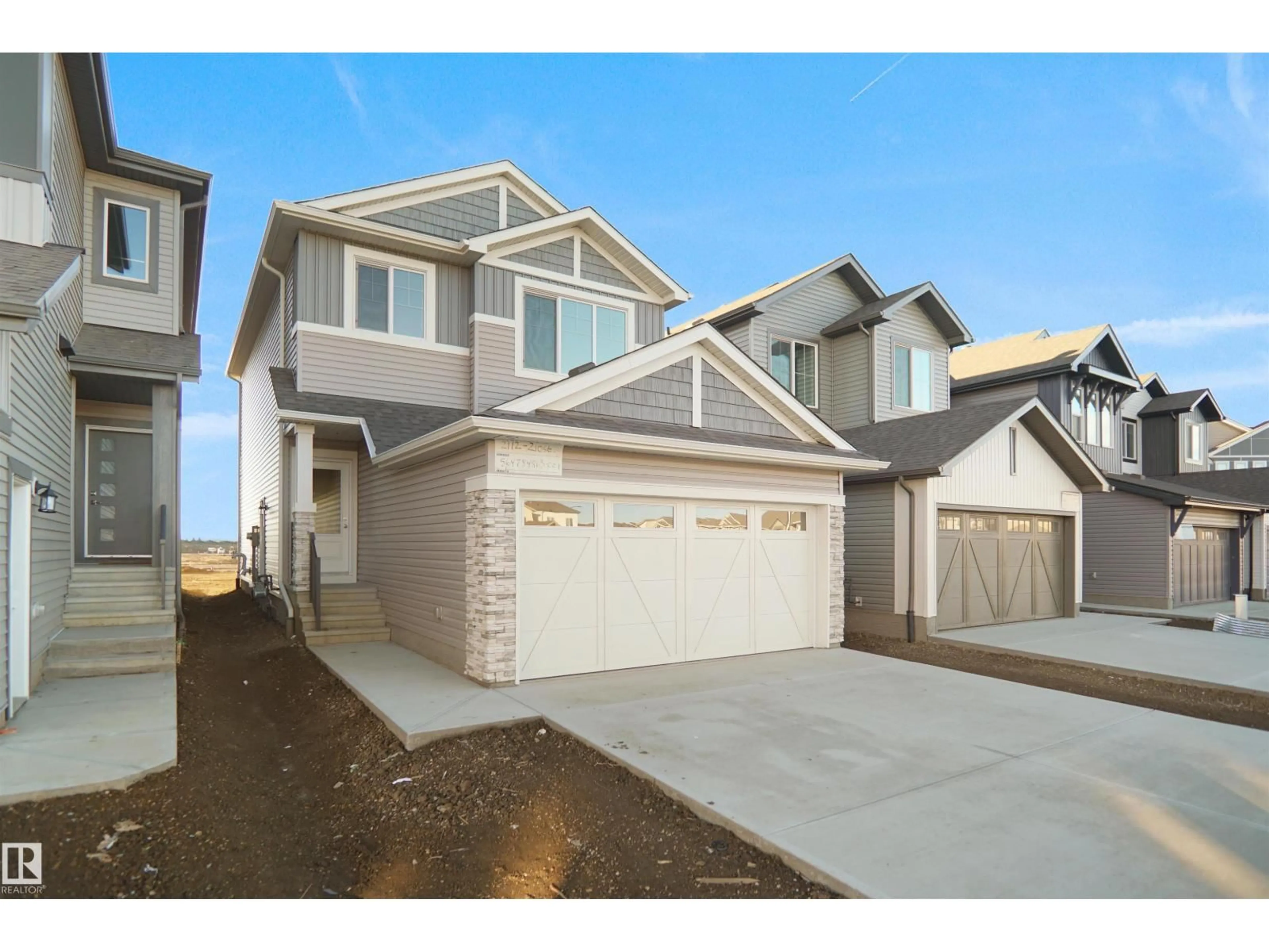 Home with vinyl exterior material, street for NW - 1537 208 ST, Edmonton Alberta T6W5T6