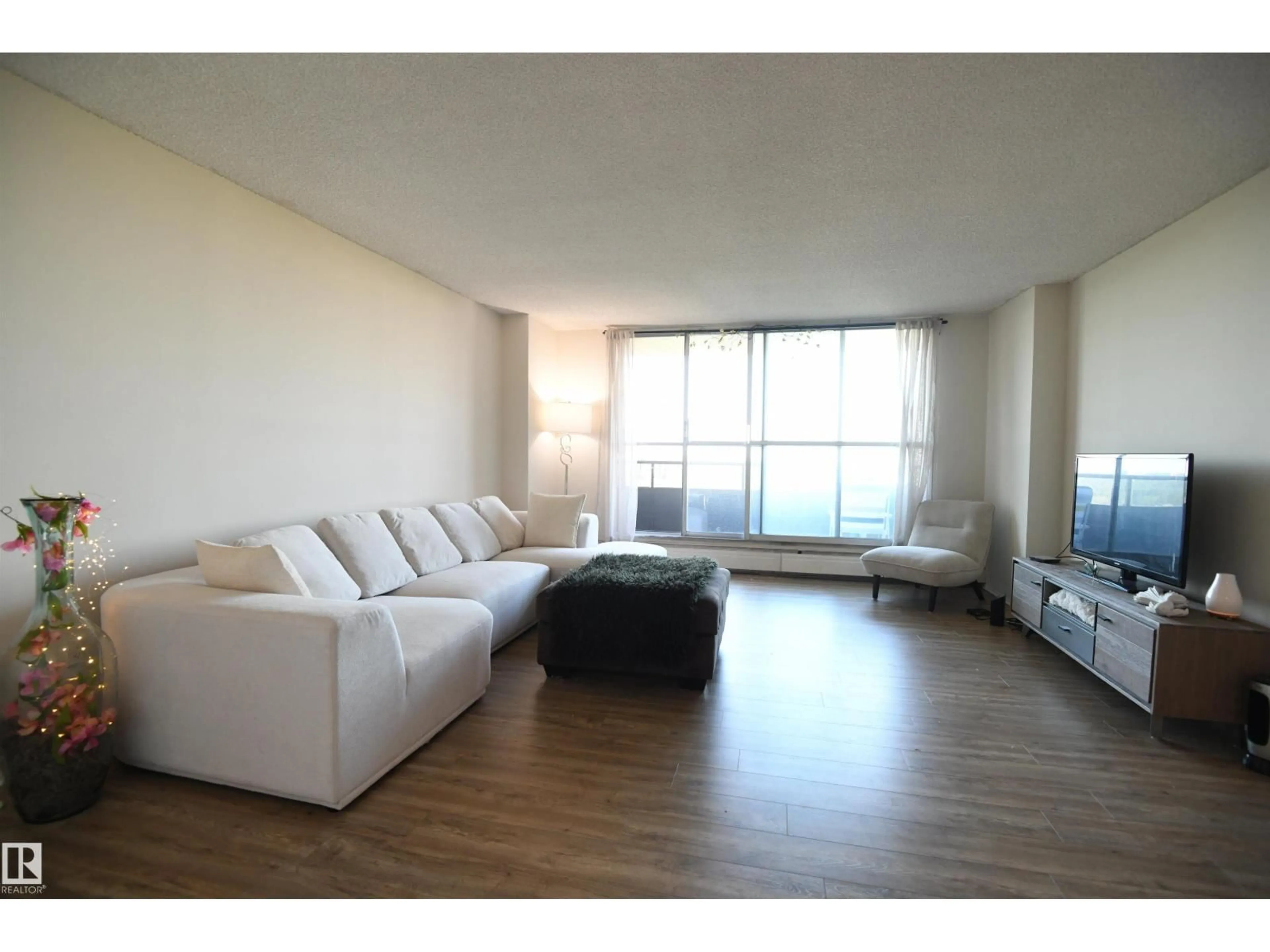 Living room with furniture, unknown for 1305 STONY PLAIN RD, Edmonton Alberta T5N3R2