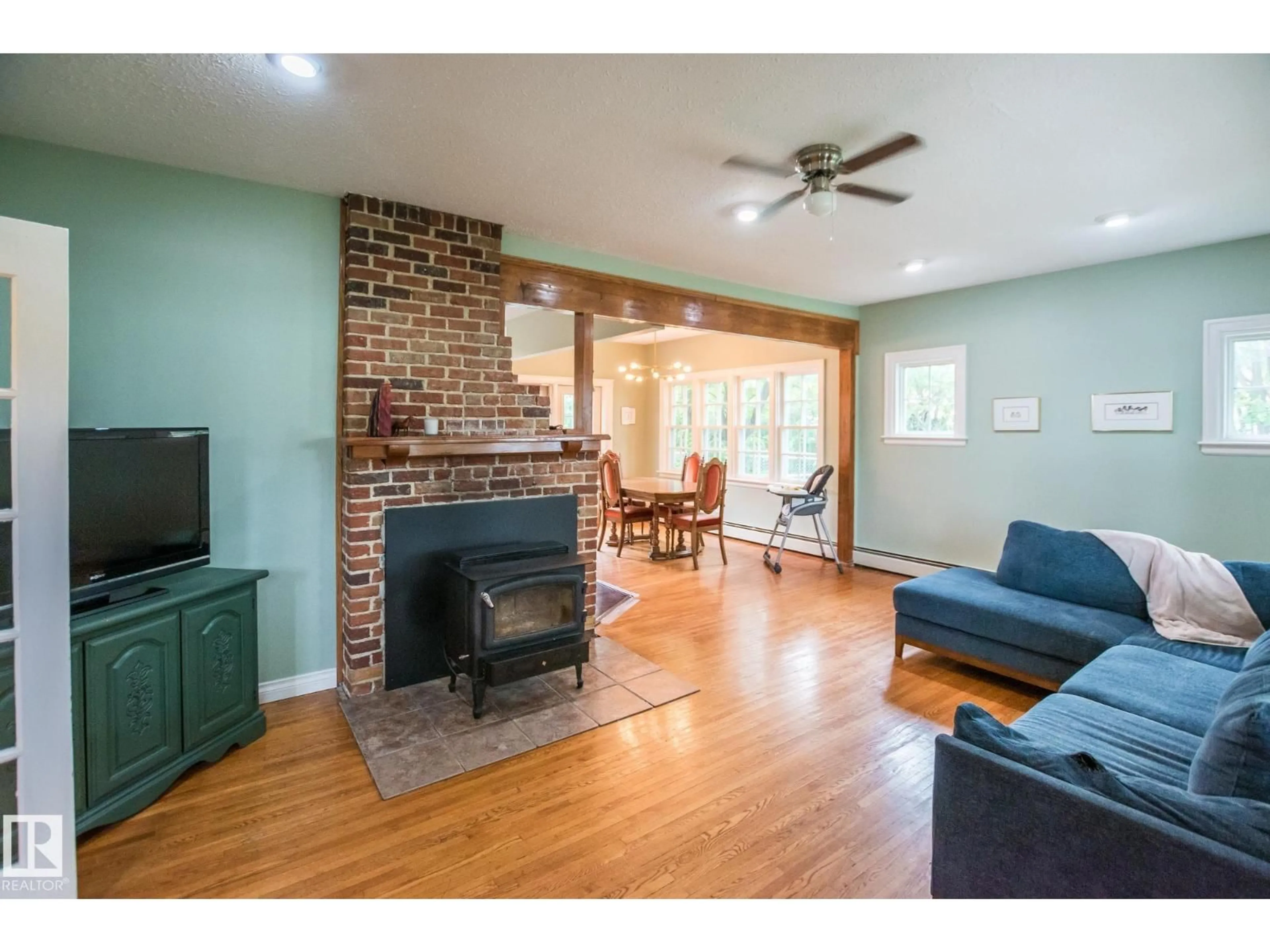 Living room with furniture, wood/laminate floor for 4811 50 ST, Bonnyville Town Alberta T9N2G9