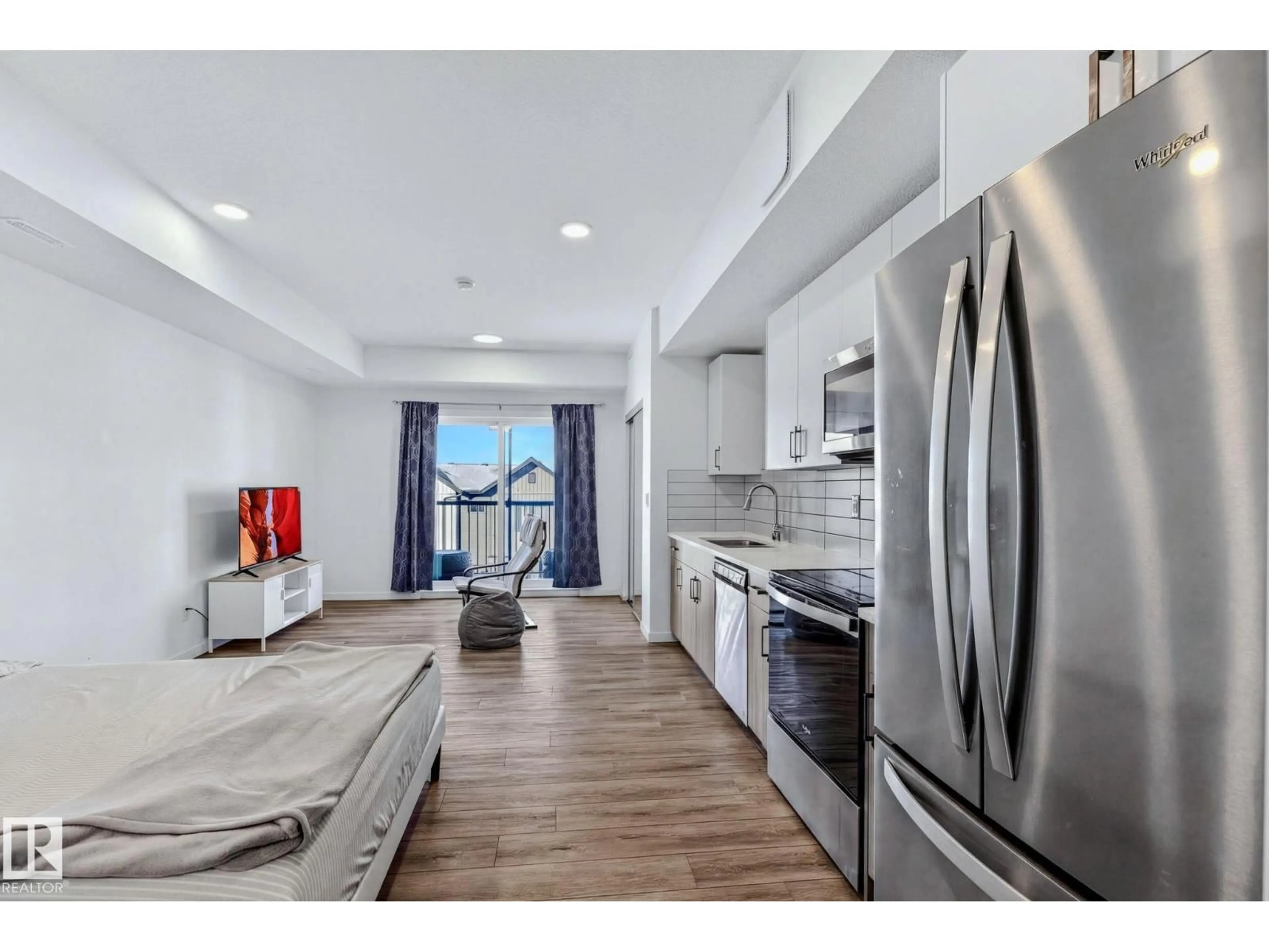 Open concept kitchen, ceramic/tile floor for #301 - 864 SECORD BV, Edmonton Alberta T5T7R9