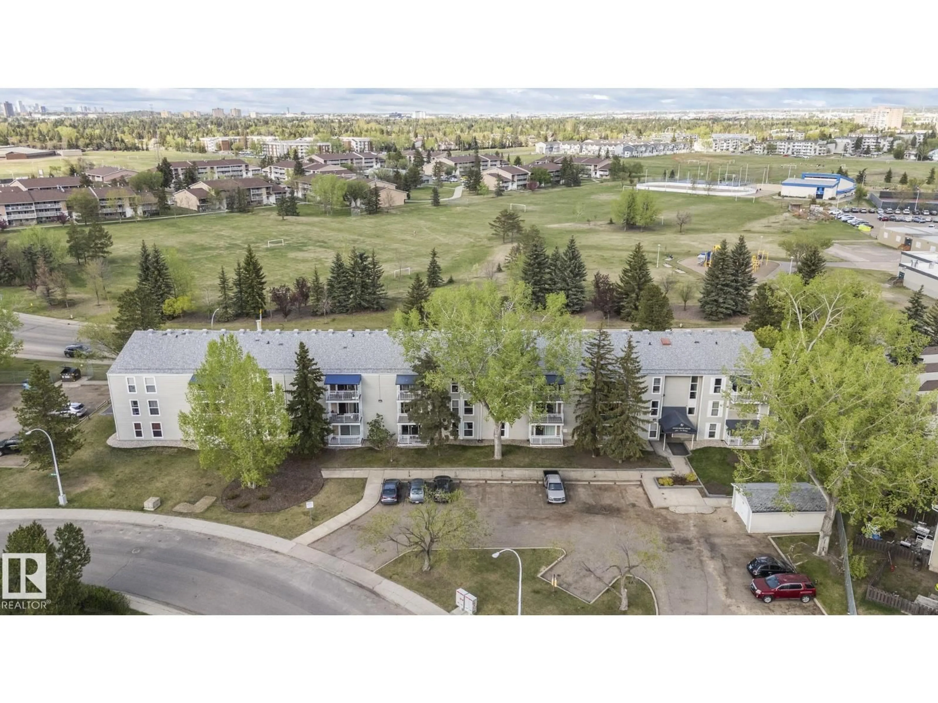 A pic from outside/outdoor area/front of a property/back of a property/a pic from drone, mountain view for #204 - 2545 116 ST NW, Edmonton Alberta T6J3Z7