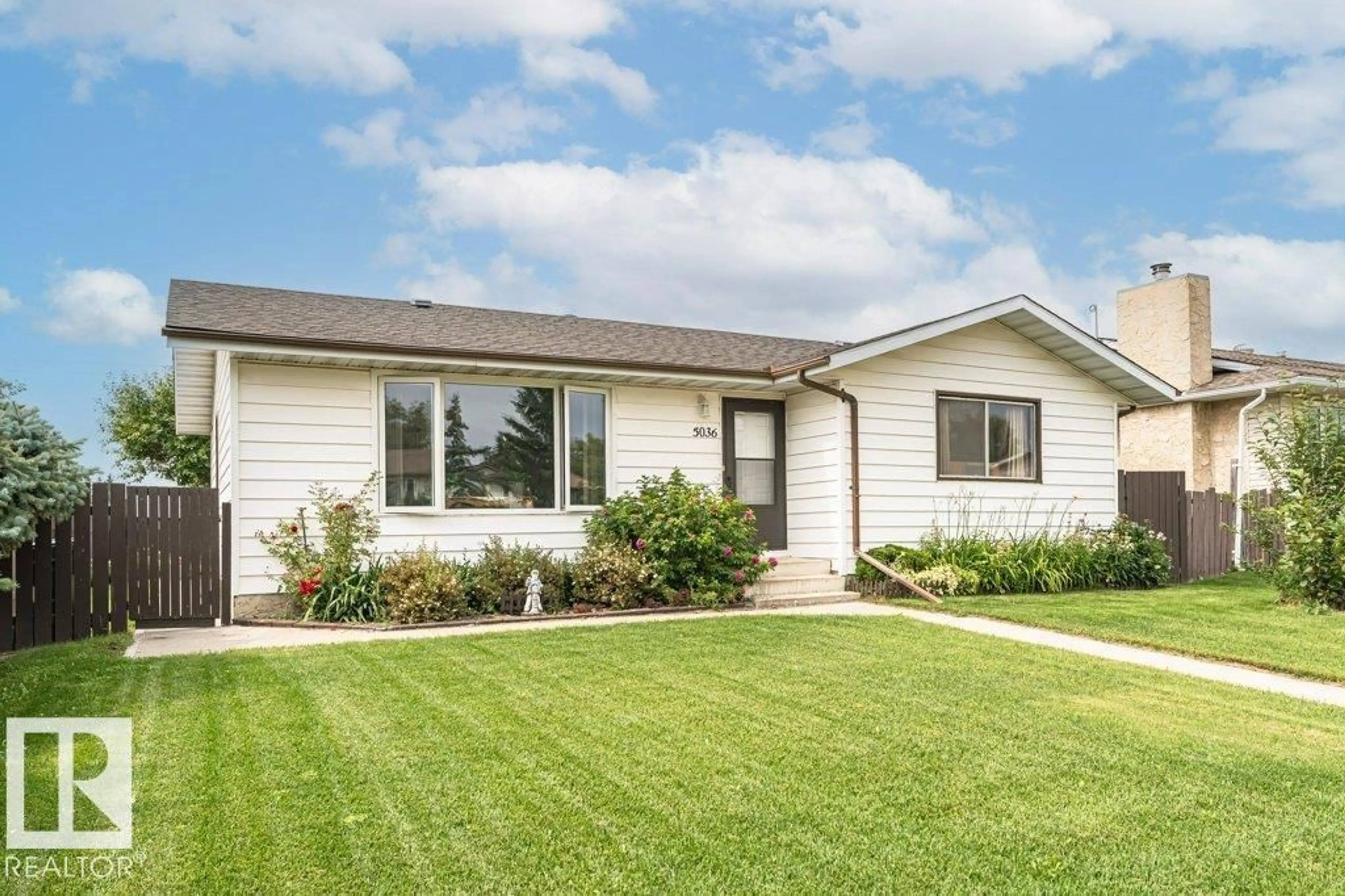 Home with vinyl exterior material, street for 5036 47 ST, Lamont Alberta T0B2R0