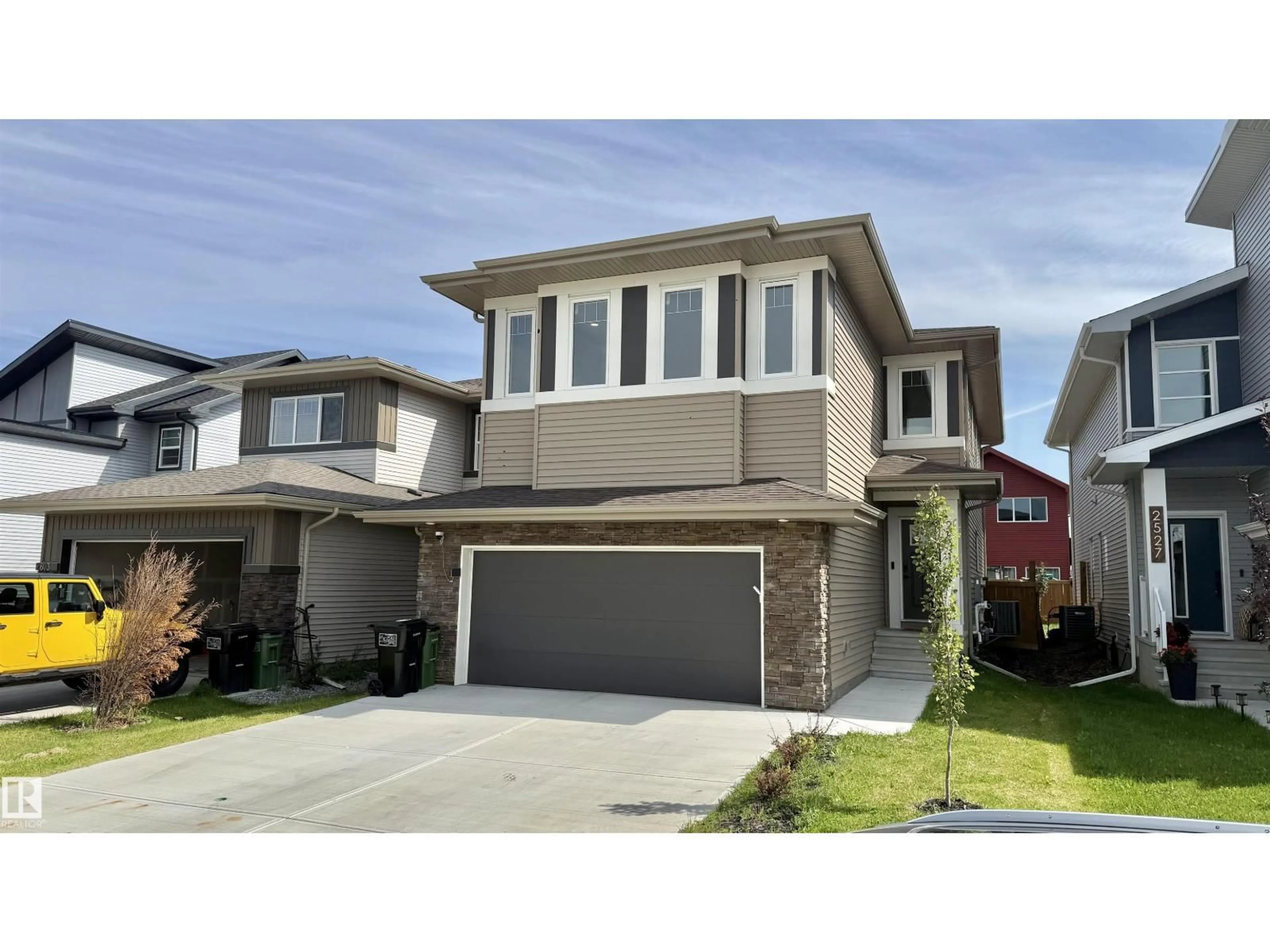Home with vinyl exterior material, street for NW - 2531 194 ST, Edmonton Alberta T6M1P5