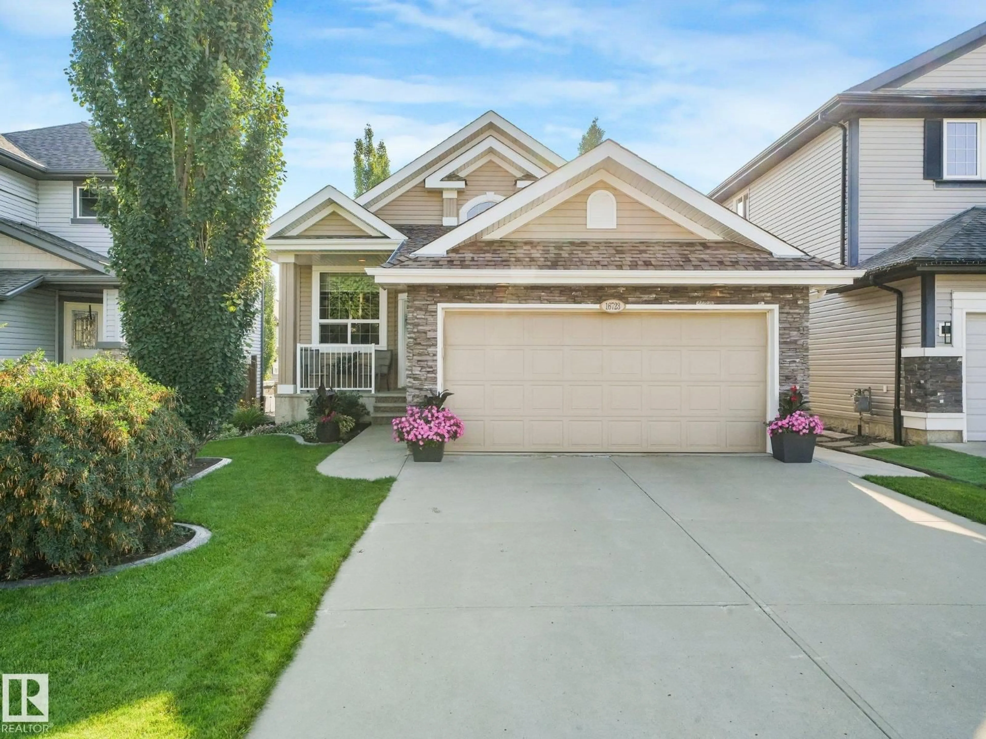 Home with vinyl exterior material, street for 16723 58 ST, Edmonton Alberta T5Y0K6