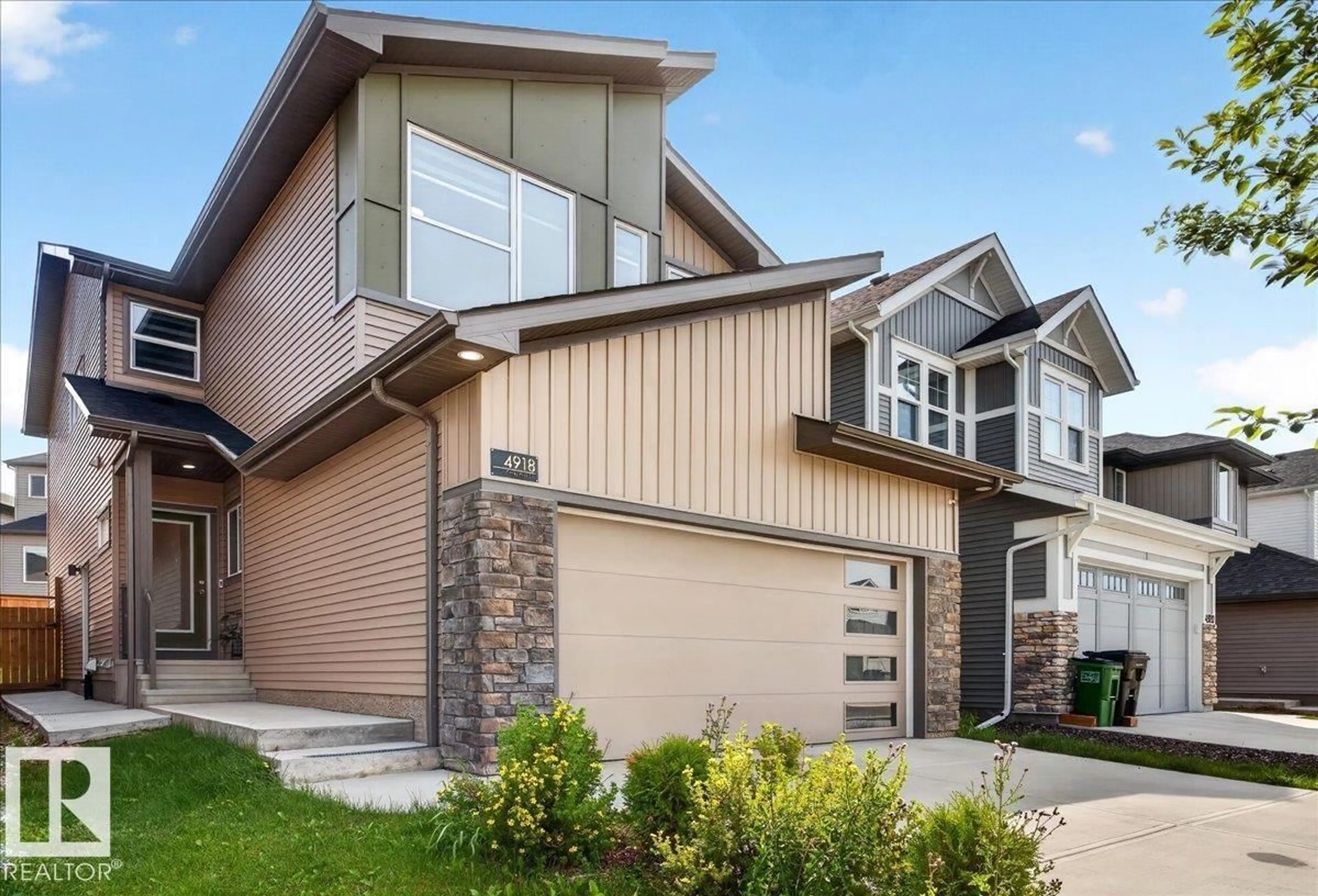 Home with vinyl exterior material, street for 4918 KINNEY RD, Edmonton Alberta T6W5H1