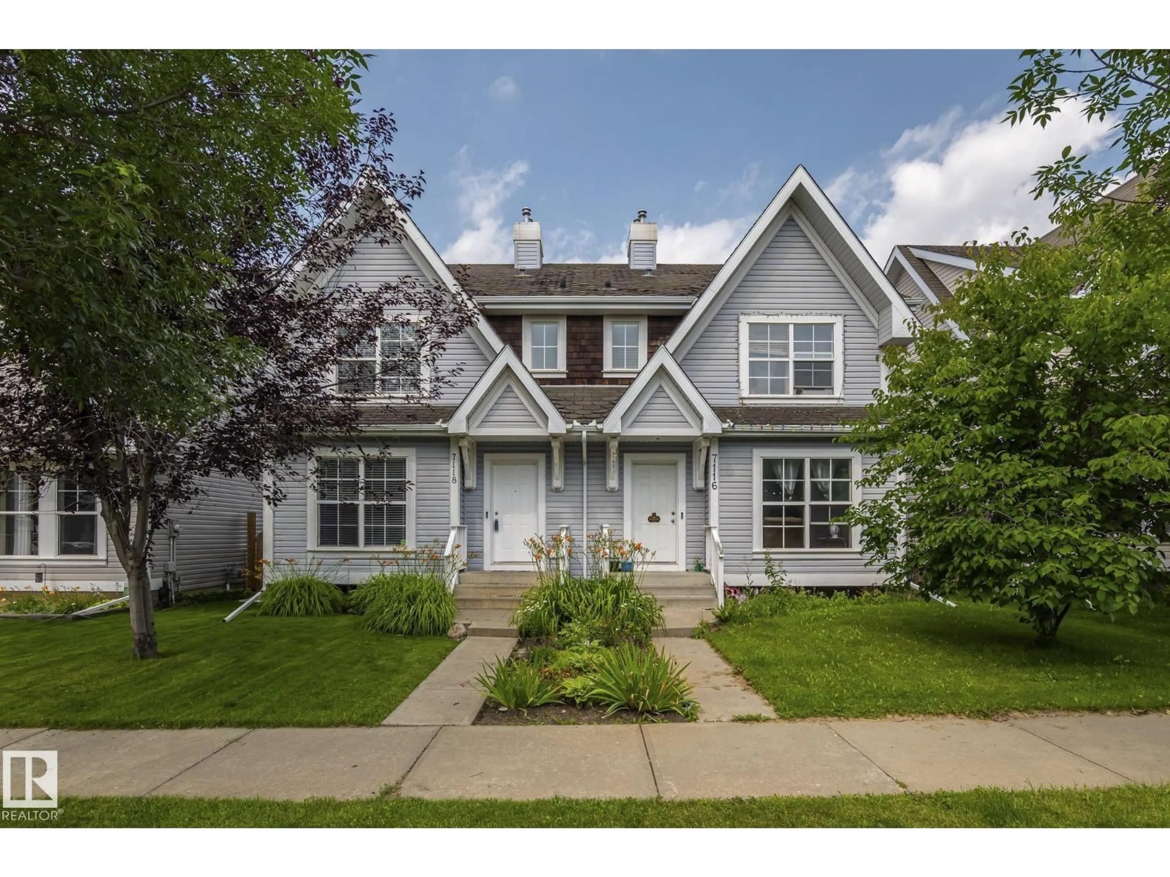 Home with vinyl exterior material, street for 7118 19A AV, Edmonton Alberta T6X0K2
