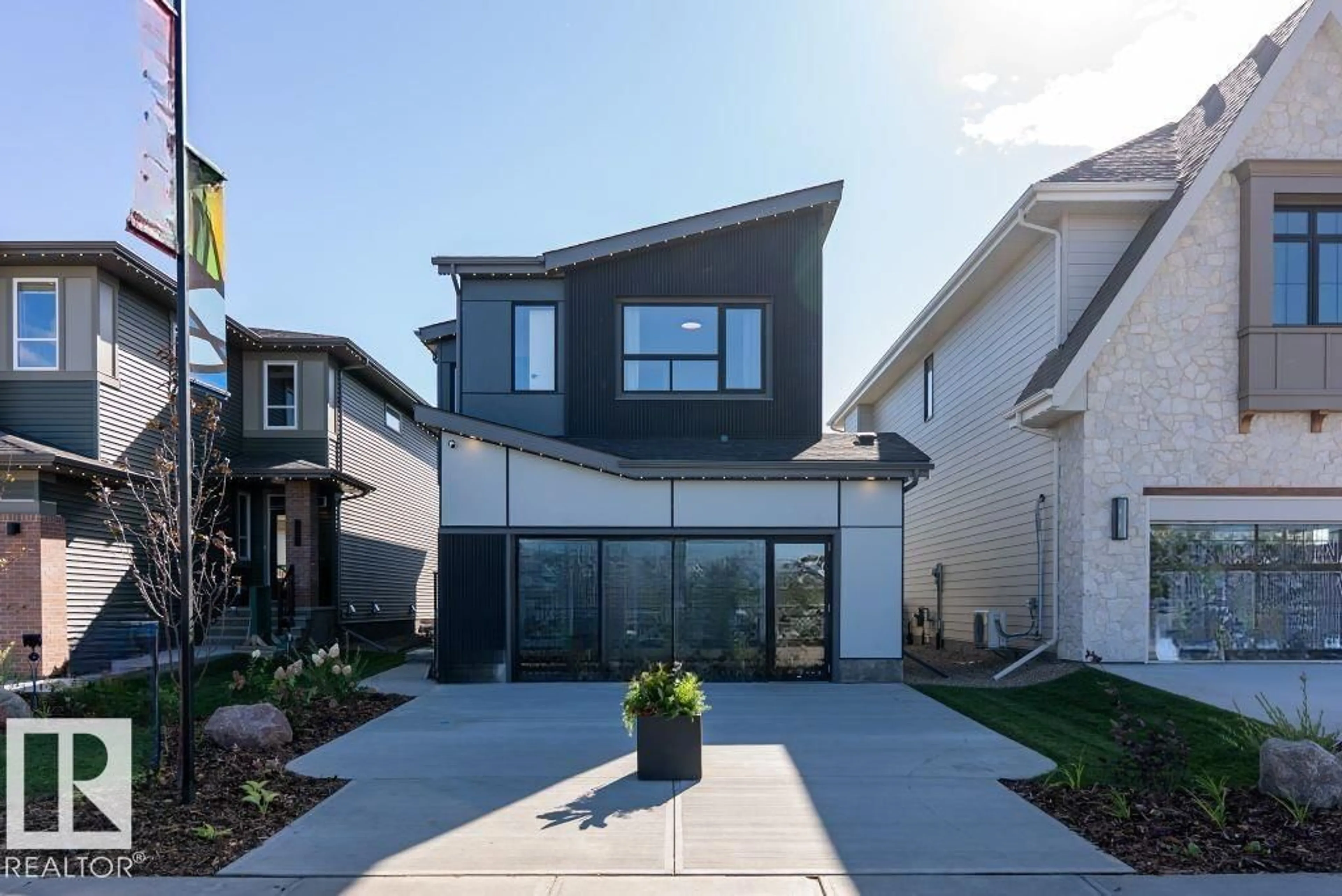 Home with vinyl exterior material, street for 6906 57 AV, Beaumont Alberta T4X2Z7