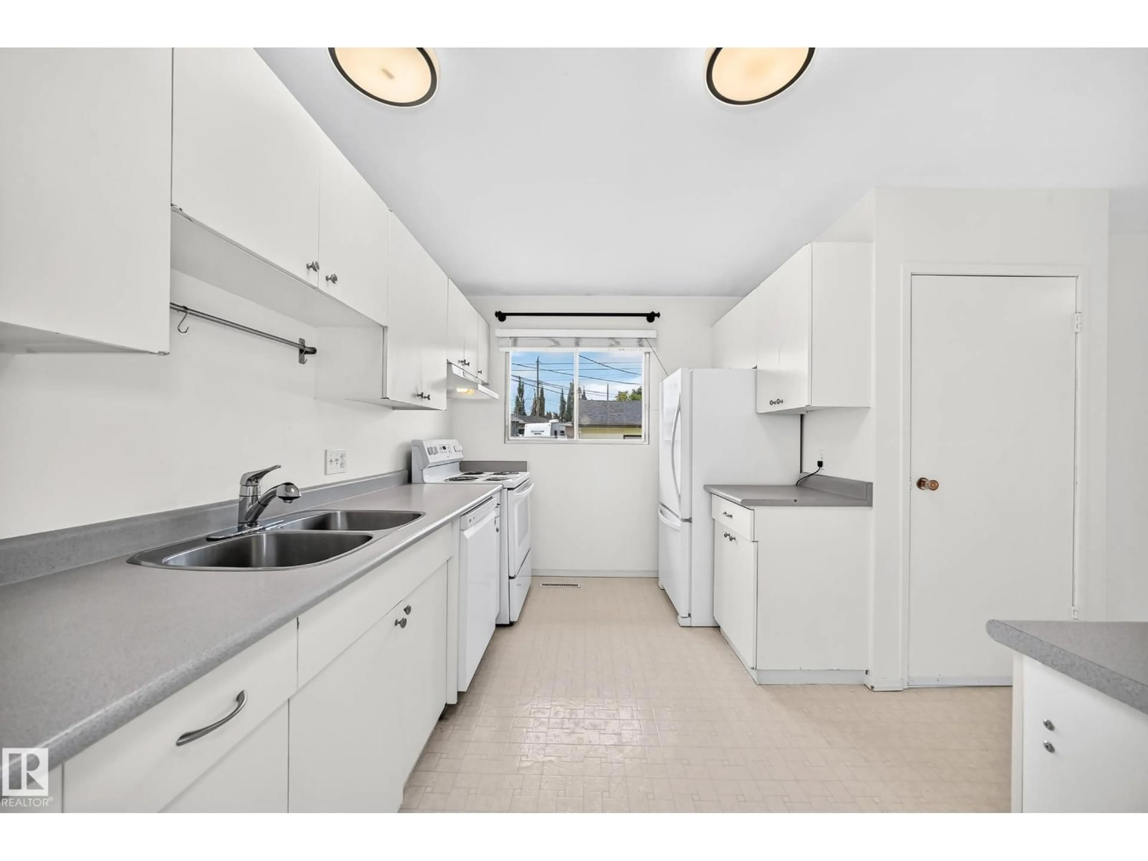 Standard kitchen, ceramic/tile floor for 9324 OTTEWELL RD, Edmonton Alberta T6B2C9