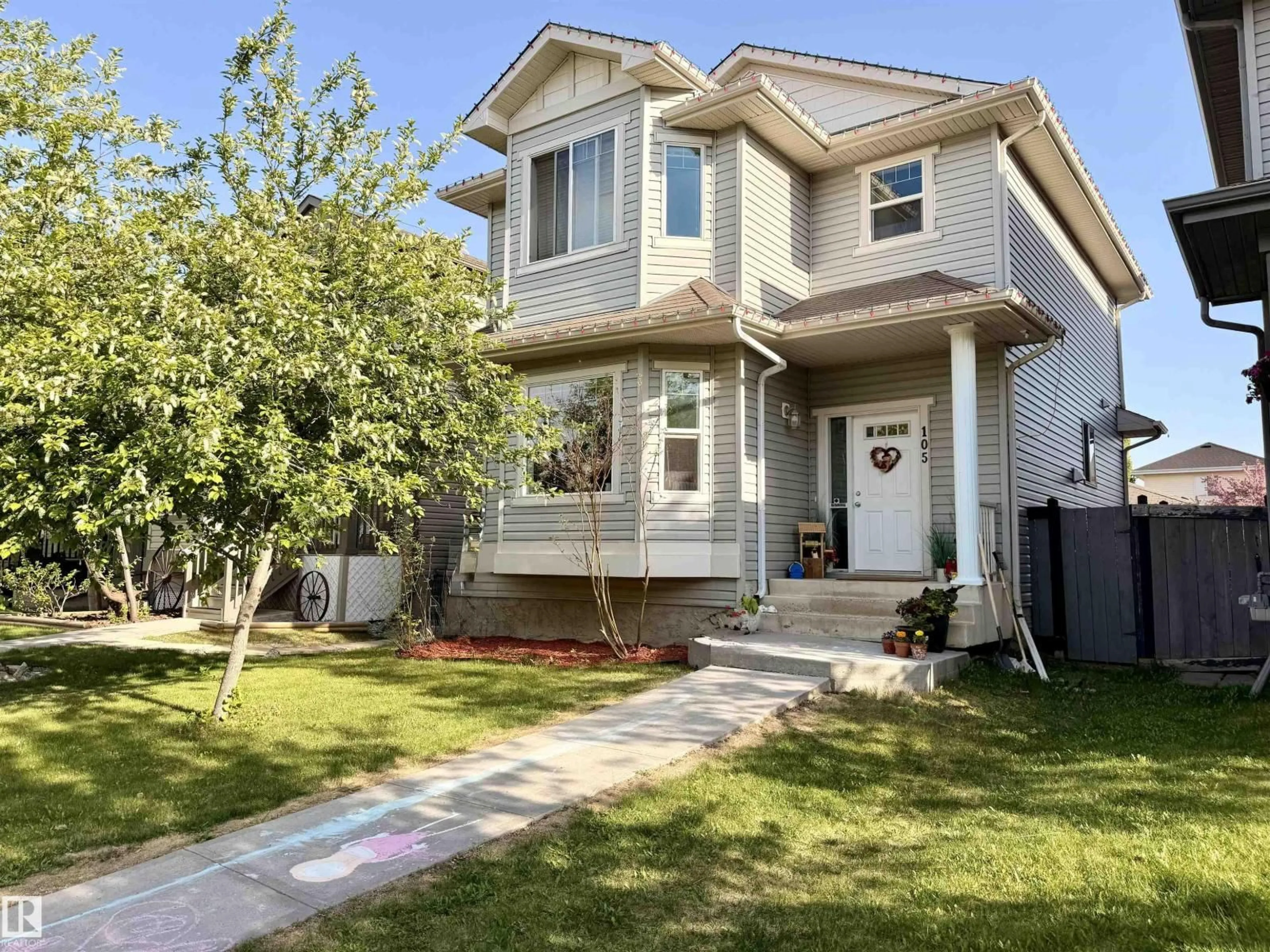 Home with vinyl exterior material, street for 105 KEYSTONE CR, Leduc Alberta T9E0J4