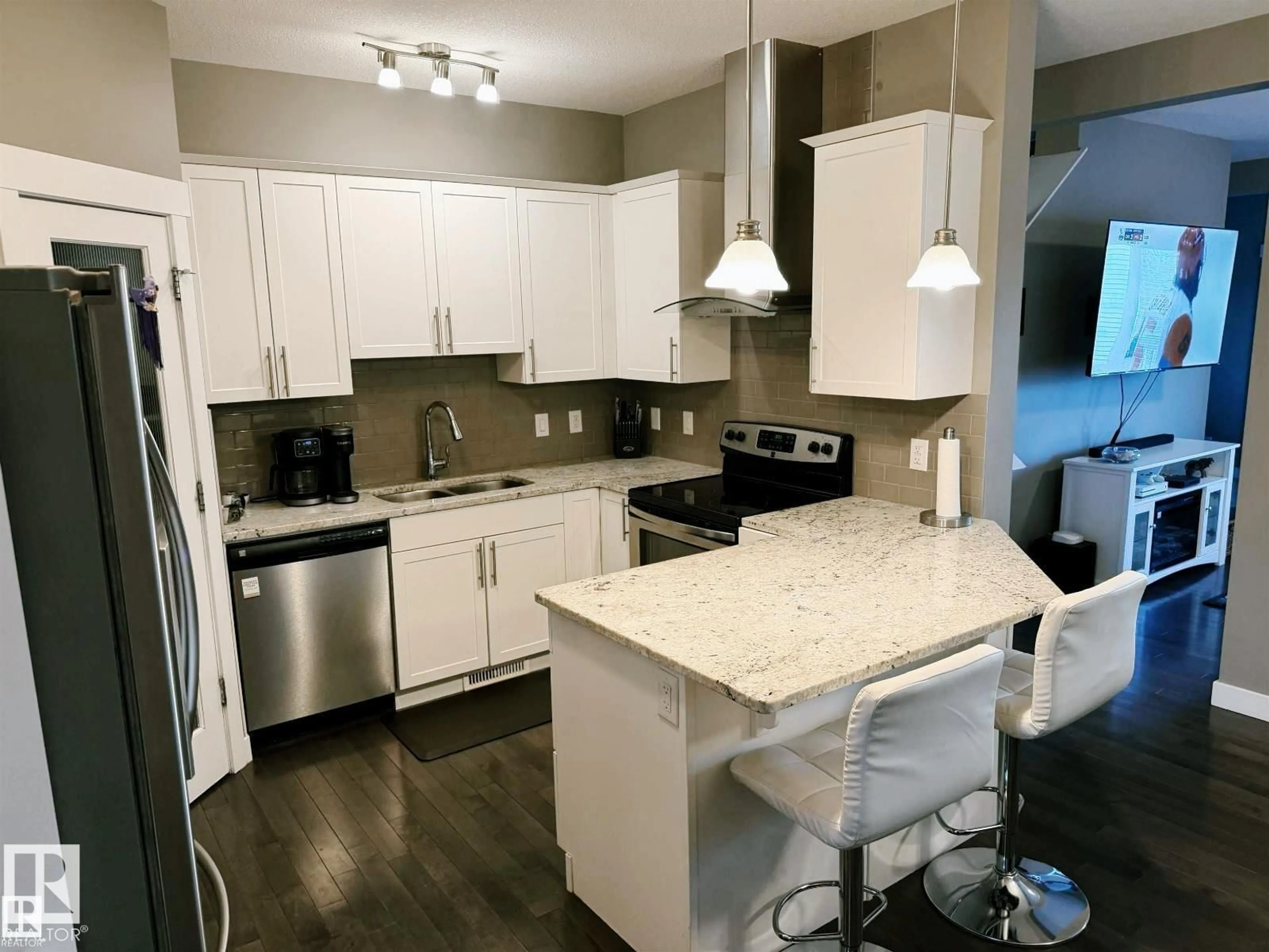 Open concept kitchen, unknown for 7028 174 AV, Edmonton Alberta T5Z0L3
