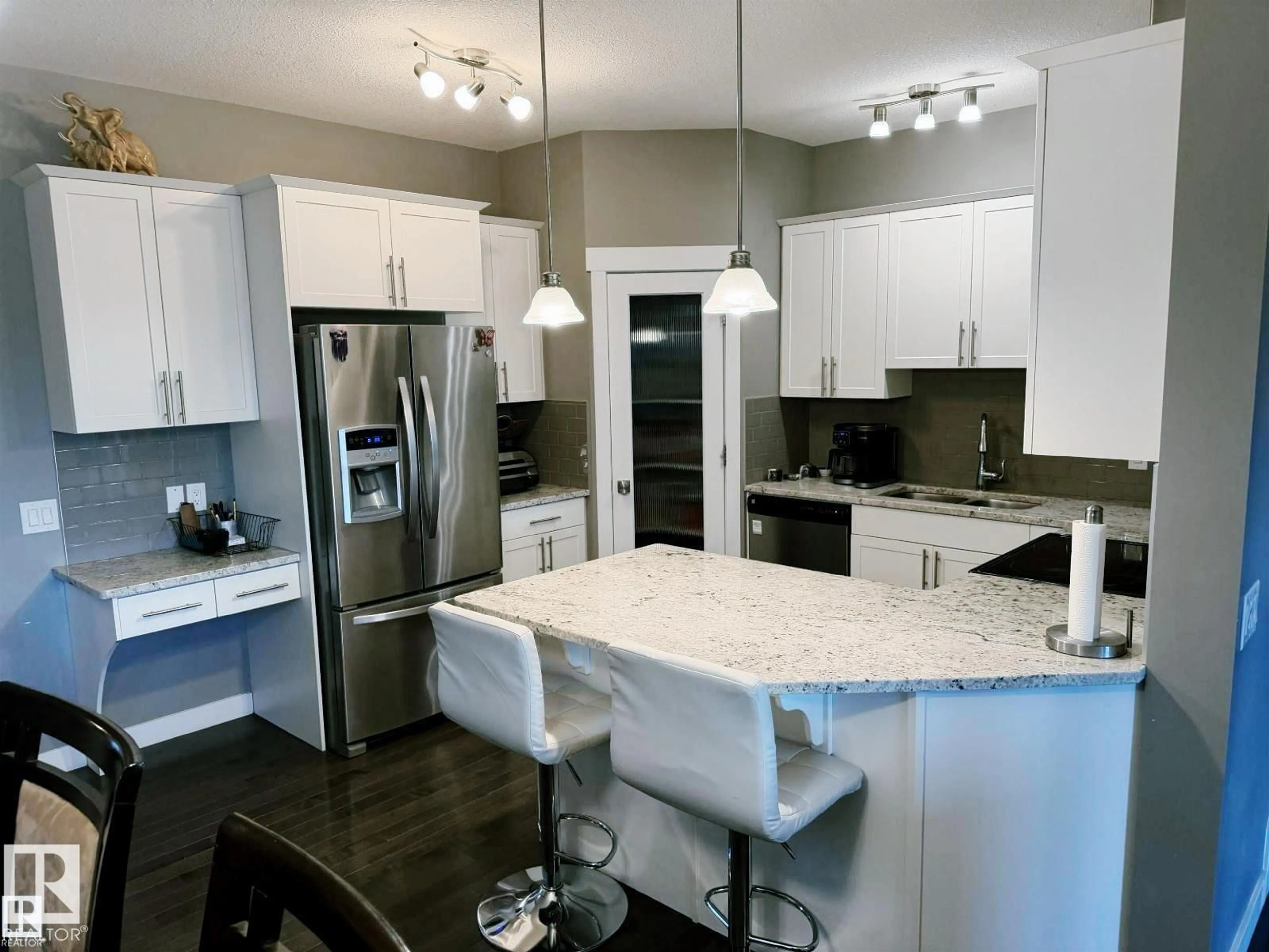 Open concept kitchen, unknown for 7028 174 AV, Edmonton Alberta T5Z0L3