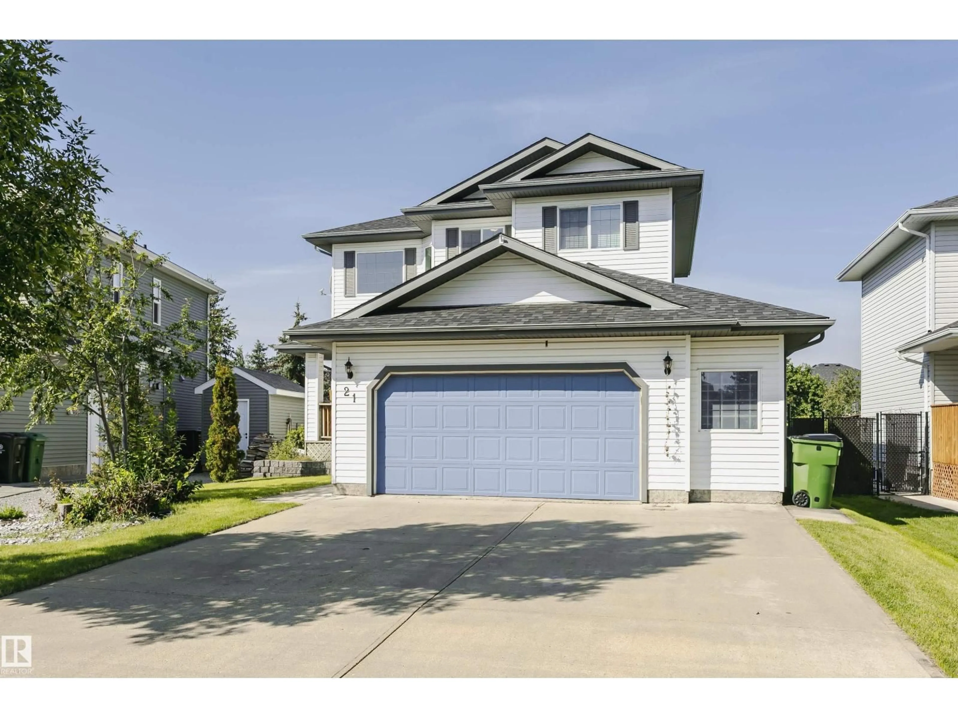 Home with vinyl exterior material, street for 21 ALDERSON CL, Fort Saskatchewan Alberta T8L4M9